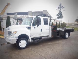 2015 International TerraStar Flat 14 foot Deck Hydraulic Brake Diesel, 8 foot width, 4x4 6.4L V8 DIESEL engine, engine - Max Force, 8 cylinder, 2 door, automatic, 4X4, cruise control, air conditioning, AM/FM radio, power door locks, power windows, white exterior, black interior, cloth, Wheelbase 210 inches, transmission: Allison Optimized, Engine hours 5978 hrs, PTO hours 2316 hrs, tires size- 245/70R19.5, From the centre of the rear tire to the end of the flat deck - 67 inches,  Certificate and Decal valid to January 2024. $49,510.00 plus $375 processing fee, $49,885.00 total payment obligation before taxes.  Listing report, warranty, contract commitment cancellation fee, financing available on approved credit (some limitations and exceptions may apply). All above specifications and information is considered to be accurate but is not guaranteed and no opinion or advice is given as to whether this item should be purchased. We do not allow test drives due to theft, fraud and acts of vandalism. Instead we provide the following benefits: Complimentary Warranty (with options to extend), Limited Money Back Satisfaction Guarantee on Fully Completed Contracts, Contract Commitment Cancellation, and an Open-Ended Sell-Back Option. Ask seller for details or call 604-522-REPO(7376) to confirm listing availability.