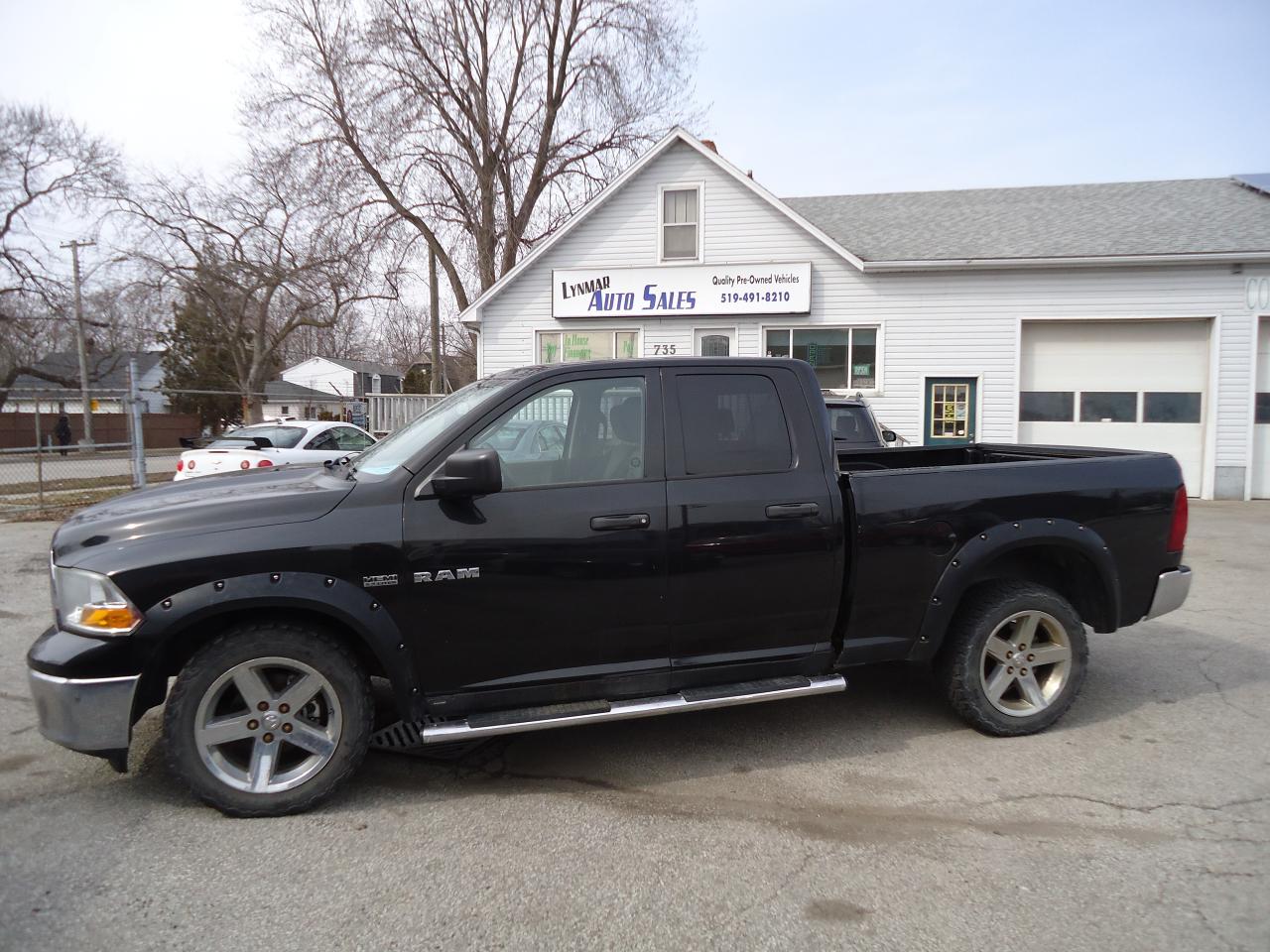 2010 Dodge Ram 1500 4WD QUAD CAB 140.5" SLT