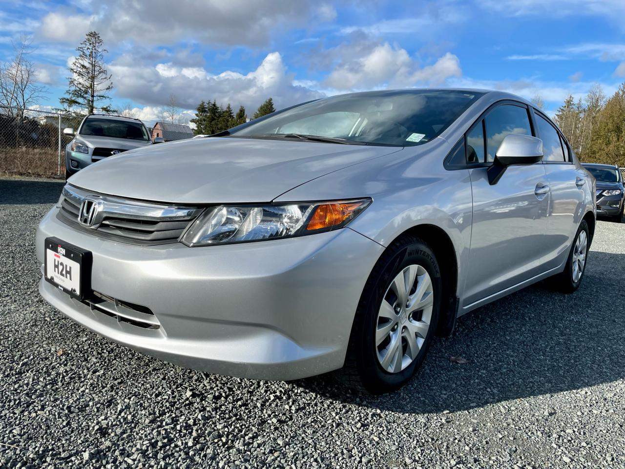 2012 Honda Civic 4dr Auto LX Photo1