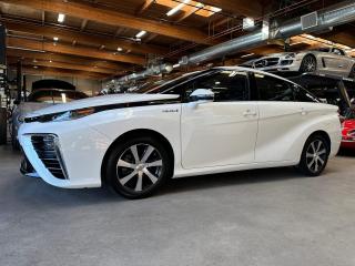 This accident free Toyota Mirai Hydrogen Fuel Cell was originally from California and was imported to Canada in 2019. Well equipped with Heated power SofTex front seats, Heated rear seats, Dual zone climate control, Navigation, JBL Premium audio system, Satellite radio, Aux input, Usb input, Bluetooth, Bluetooth audio, Steering wheel controls, Heated steering wheel, Power tilt / telescopic steering wheel, Power windows, Power door locks, Power folding mirrors, Blind spot monitoring, Lane departure alert, Adaptive cruise control, Pre collision system, Keyless touch entry and locking, Keyless push button ignition, Wireless phone charger, Back up camera, Parking sensors, LED Headlights, LED Running lights, 17 Alloy wheels. Hydrogen fuel cell powering an electric motor mated to a 1 speed direct drive rated at 151hp / 247lb-ft. A 1 year warranty is included in the purchase price of this vehicle. Well maintained and just fully serviced at Toyota. Leasing and financing available. All trades accepted. 
 Viewing by appointment 
 Dealer # 10290 null