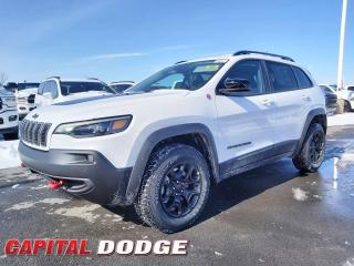 This Jeep Cherokee delivers a Intercooled Turbo Premium Unleaded I-4 2.0 L engine powering this Automatic transmission. TRANSMISSION: 9-SPEED AUTOMATIC W/ACTIVE DRIVE II (STD), QUICK ORDER PACKAGE 2ZK TRAILHAWK -inc: Engine: 2.0L DOHC I-4 DI Turbo w/ESS, Transmission: 9-Speed Automatic w/Active Drive II, K-BLACK DOOR TRIM PANEL APPLIQUES.*This Jeep Cherokee Comes Equipped with These Options *BRIGHT WHITE, BLACK, PREMIUM LEATHER-FACED BUCKET SEATS, Wheels: 17 x 7.5 Black Aluminum, Vinyl Door Trim Insert, Valet Function, Upfitter Switches, Trunk/Hatch Auto-Latch, Trip Computer, Transmission w/Driver Selectable Mode, AUTOSTICK Sequential Shift Control and Oil Cooler, Tracker System.* Why Buy From Us? *Thank you for choosing Capital Dodge as your preferred dealership. We have been helping customers and families here in Ottawa for over 60 years. From our old location on Carling Avenue to our Brand New Dealership here in Kanata, at the Palladium AutoPark. If youre looking for the best price, best selection and best service, please come on in to Capital Dodge and our Friendly Staff will be happy to help you with all of your Driving Needs. You Always Save More at Ottawas Favourite Chrysler Store* Stop By Today *For a must-own Jeep Cherokee come see us at Capital Dodge Chrysler Jeep, 2500 Palladium Dr Unit 1200, Kanata, ON K2V 1E2. Just minutes away!