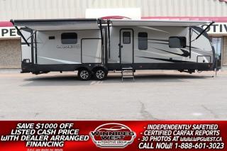 **Cash Price: $47,800 Finance Price: $46,800 (SAVE $1,000 OFF THE LISTED CASH PRICE WITH DEALER ARRANGED FINANCING! O.A.C.) Plus PST/GST. No Administration Fees!!** Free CARFAX Vehicle History Report available on every RV!  

ITS MORE THAN LUXURY AND HIGH END FINISHES... ITS QUALITY CONSTRUCTION LIKE NO OTHER! TRAVEL IN COMFORT AND STYLE WITH THIS HIGH END 3 SLIDE, LARGE REAR KITCHEN/LOUNGE, RESIDENTIAL QUALITY RV. THIS IS QUALITY, AND IT IS PRICED TO SELL!! This RV oozes elegance and offers more upgrades than most any other RV youll see on the market. STILL AS NEW IN ALL RESPECTS -  2020 Keystone Laredo 335MK with a high end rear lounge and master chef kitchen! It boasts 3 Big Slides and from the appliances to the carpeting, its still like new in all respects.

You can definitely entertain with this 38ft 2020 Keystone Laredo RV model 335MK! This unit features a deluxe Chef rear kitchen layout with two high end refrigerators, triple slides, a king size bed, 2- 40" FLAT SCREEN TVs  and stereo both inside/ outside!! Yes, that is right there is a huge entertainment center outside!!

Step inside and be blown away by the high end residential finishes. The location of the deluxe bathroom is almost directly opposite the door, so no dirty feet in and through your new home.  Here you will enjoy a large shower, toilet, and vanity with sink, plus overhead medicine cabinet too.  

Through the door at the end of the hall, just outside the bathroom to your left, step into the Private master bedroom which features a comfortable king size bed slide out including overhead storage. The slide provides added foot traffic space around the bed, and there is ample storage for your clothing with a dresser along the curb side, and a full wall master closet along the front. You will also find pass-through storage beneath this area for all of your outdoor camping gear as well.

Back to the entry door notice the storage cabinet to your immediate left just inside the door. Further in, a slide out along the curb side featuring an Large entertainment center with a 40" TV, an included Stereo and huge fireplace!! There is also a true gourmets dream kitchen! Theres so much room and a LOT OF STORAGE thanks to the  Slide pushing out the kitchen galley wall. It really opens the space and gives it a warm homey feel. That warmth youll feel comes in part from the real wood cabinetry, trim and fascia along with the Corian solid surface counter tops, stove and sink covers. Youll enjoy all the amenities of home with 2 refrigerator and freezers, a 3 burner stove with oven, over mount microwave and deep floor-to-ceiling pantries... that would be plural as there are more than one, and there is  lots of counter-top space for cooking and food prep with the off set island including a large sink and added counter-top prep space, plus more.. Adjacent along the rear wall there is more storage, two refrigerators for your perishable items, and a nice size pantry.  The Chef in the family will absolutely love being in this space. Theyll also enjoy being open to the entertaining area but not IN IT! 

When you are done cooking you can sit down and enjoy your meal at the free standing dinette found within the road side slide. There is also more seating here for relaxing and hanging out with a theater seat for two. Along the interior wall a tri-fold sofa sleeper that can double as a bed for any overnight family or guests.

There are  High Efficiency LED interior lights throughout the RV making it bright and cozy. Moving outside there are 2 large power awnings to cover you on those hot or rainy days and Air conditioning for the hot summer nights! There is lots of outdoor storage, an outdoor shower and best of all it has a a fully equipped with a high end entertainment area including an outside 40" TV and stereo (great for movie nights outside or the Sunday Game with the guy). This RV is easy to set up and is equipped with power front and rear leveling jacks and a power front hitch. And Most importantly and you can even RV longer into the season with  the extended weather/Cold "Polar Package"  with enclosed and heated underbelly so RV late into the season!   This RV is  Perfect for Vacationing, Adventuring or just Relaxing on a seasonal lot here or down south where it is warm - it has a great high end entertaining layout and is loaded with high end features. This is a very high end RV with High end finish and features would expect in a luxury home. 1st Class in all respects. The list of features and upgraded is to long to list - Must See - Absolutely still as new in all respects. A true must see - you will not be disappointed!! 

We have completed a Safety Inspection based on the Manitoba Fire Commissioners Office guidelines.  This RV comes with a Clean, No Accident 1-owner Local Manitoba CARFAX history report and we have several extended warranty options available to choose from to protect your RV and your wallet.  ON SALE NOW (HUGE VALUE!!!) Zero down and very low payment financing available OAC. Please see dealer for details. Trades accepted. View at Winnipeg West Automotive Group, 5195 Portage Ave. Dealer permit# 4365, Call now 1(888) 601-3023.