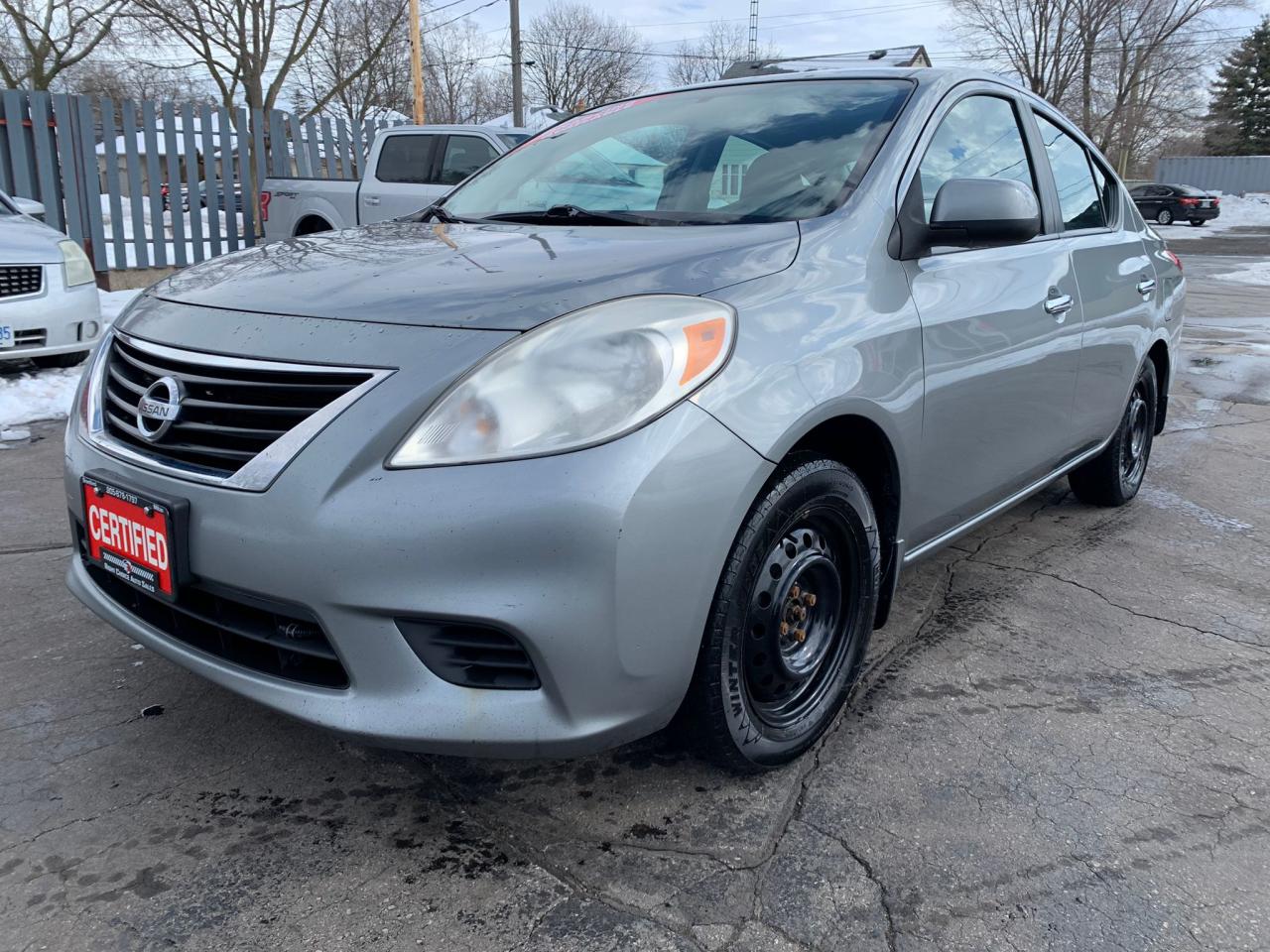 2012 Nissan Versa 4dr Sdn CVT 1.6 SV - Photo #1