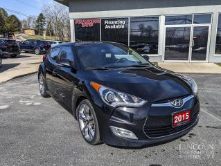 Keyless Entry, Moonroof, Navigation, Ultra Black Pearl finish & ONLY 111,393kms!

2015 Hyundai Veloster Tech Ultra Black Pearl

Features!
-Tech FWD 6-Speed Automatic 1.6L I4 DGI DOHC 16V
-18" x 7.5J Aluminum Alloy Wheels, 
-8 Speakers
-AM/FM radio: SiriusXM, CD player
-Exterior Parking Camera Rear
-Front fog lights
-Fully automatic headlights
-Heated door mirrors
-Heated Front Bucket Seats
-Heated front seats
-Illuminated entry
-Leather steering wheel
-Navigation System
-Occupant sensing airbag
-Outside temperature display
-Power moonroof
-Radio: AM/FM/XM/CD/MP3 Dimension Premium Audio
-Rear window defroster
-Rear window wiper
-Remote keyless entry
-Split folding rear seat

Reviews:* Veloster has impressed many an owner with its features-for-the-dollar quotient, pleasing performance from turbocharged models, highly flexible interior, and relatively generous cargo space. The unique looks and plentiful customization options helped round out the package.
Whether you are looking for a great place to buy your next used vehicle, find a qualified repair centre, or looking for parts for your vehicle, Lincoln Township Motors has the answer for you. We are committed to the needs of our customers and stay ahead of the competition. Theres no way to buy the wrong vehicle from Lincoln Township Motors!

Book your test drive today! 

 WE BUY CARS! Any make, model or condition, No purchase necessary.
Come Visit us Today! 

4735 King St. Beamsville, L3J 1E9 
Call Us For All Your Automotive Needs!

*All Lincoln Township Motor vehicles have a CarFax report. Please contact for more information*