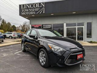 Bluetooth, Keyless Entry, Heated Door Mirrors, FWD, Only 66,574kms!

2017 Toyota Yaris in the sleek Black Sand Pearl finish

FWD 6-Speed 1.5L 4-Cylinder
-	16" Steel Wheels
-	4 Speakers
-	ABS brakes
-	Air Conditioning
-	AM/FM radio
-	Fabric Seat Trim
-	Front wheel independent suspension
-	Heated door mirrors
-	Illuminated entry
-	Low tire pressure warning
-	Outside temperature display
-	Window defroster
-	Remote keyless entry
-	Speed-sensing steering
-	Split folding rear seat
-	Steering wheel mounted audio controls

Reviews: * The Yaris Hatchback is highly rated for maneuverability, brand reputation, fuel efficiency, and flexibility. Many owners report that the cabin is larger than expected, given the overall size of the vehicle, and most enjoy ride quality on par with a larger car.
Awards: * IIHS Canada Top Safety Pick

Whether you are looking for a great place to buy your next used vehicle, find a qualified repair centre, or looking for parts for your vehicle, Lincoln Township Motors has the answer for you. We are committed to the needs of our customers and stay ahead of the competition. Theres no way to buy the wrong vehicle from Lincoln Township Motors!

Book your test drive today! 

WE BUY CARS! Any make, model or condition, No purchase necessary.

Come Visit us Today!
4735 King St. Beamsville, L3J 1E9
Call Us For All Your Automotive Needs!

*All Lincoln Township Motor vehicles have a CarFax report. Please contact for more information*