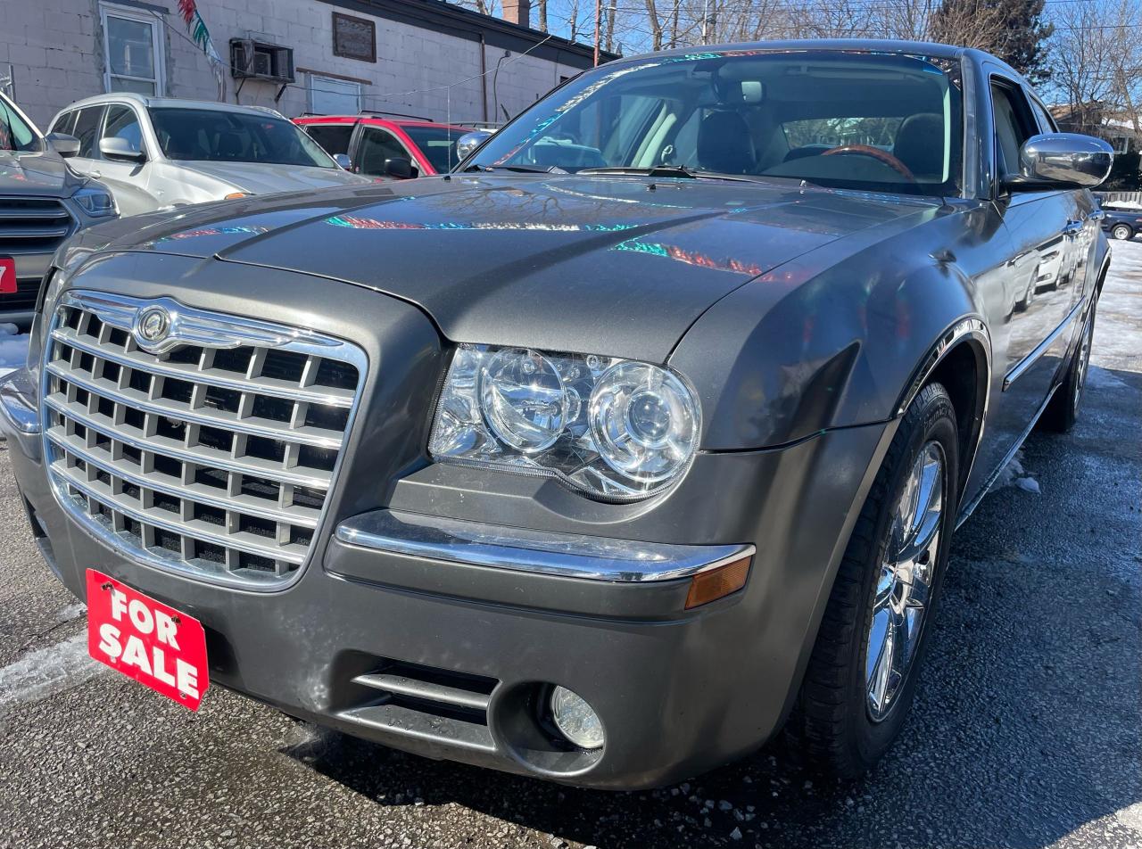2009 Chrysler 300 Comes with sunroof, Leather seats, Cruise control, Heated seats, Bluetooth,Aux And Alloy wheels in this 300 Limited Photo2