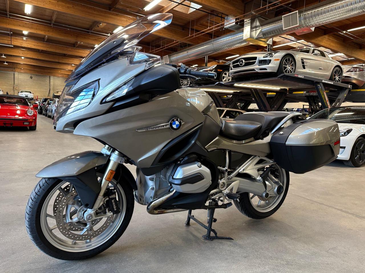 A local accident free BMW R 1200 RT. Well equipped with Heated front and rear seats, Heated handle grips, Radio, Satellite radio, Aux input, Usb input, Push button ignition, Cruise control, Dynamic ESA, Drive mode select, Traction control system ASC, Removable side bags, Power up and down windshield, LED Running lights, Brembo brakes, 17 Alloy wheels. 1170cc Flat twin cylinder mated to a 6 speed manual transmission rated by the factory at 125hp / 92lb-ft. Well maintained and just serviced. Leasing and financing available. All trades accepted. 
 Viewing by appointment 
 Dealer # 10290 null