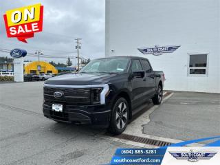<b>Running Boards, Spray-in Bedliner!</b><br> <br>   Offering all the brawn and capability you need, coupled with an electric powertrain that can help you work smarter and in more places, this F-150 Lightning is a modern game changer. <br> <br>With an advanced all-electric powertrain, this F-150 Lightning continues the Ford Motors Legacy by producing a futuristic truck thats designed for the masses. More than just a concept, this F-150 Lightning proves that electric vehicles are more than just a gimmick, thanks to it impressive capability and massive network of electric charging station found throughout North America.<br> <br> This antimatter blue metallic Crew Cab 4X4 pickup   has a single speed transmission and is powered by a  DUAL EMOTOR - EXTENDED RANGE BATTERY engine.<br> <br> Our F-150 Lightnings trim level is Platinum. This F-150 Lightning Platinum is the ultimate in luxury electric trucks with an extra luxurious Nirvana leather interior that features a massive twin panel sunroof, Fords impressive SYNC 4A infotainment system complete with a larger 15 inch touchscreen, built-in navigation, wireless Apple CarPlay, Android Auto, and a premium Bang and Olufsen audio system. It also comes with exclusive aluminum wheels, heated and cooled front seats, a heated steering wheel and heated second row seats, an extended battery range, Ford Co-Pilot360 Active 2.0, and a super useful interior work surface. Additional features include a large front trunk for extra storage, pro trailer backup assist, blind spot detection, lane keep assist, a power locking tailgate, automatic emergency braking with pedestrian detection, accident evasion assist, and a 360 degree camera to help keep you safely on the road plus so much more! This vehicle has been upgraded with the following features: Running Boards, Spray-in Bedliner. <br><br> View the original window sticker for this vehicle with this url <b><a href=http://www.windowsticker.forddirect.com/windowsticker.pdf?vin=1FT6W1EV8PWG03093 target=_blank>http://www.windowsticker.forddirect.com/windowsticker.pdf?vin=1FT6W1EV8PWG03093</a></b>.<br> <br>To apply right now for financing use this link : <a href=https://www.southcoastford.com/financing/ target=_blank>https://www.southcoastford.com/financing/</a><br><br> <br/> Weve discounted this vehicle $3906. Total  cash rebate of $14000 is reflected in the price. Credit includes $14,000 Non-Stackable Cash Purchase Assistance. Credit is available in lieu of subvented financing rates.  Incentives expire 2024-05-08.  See dealer for details. <br> <br>Call South Coast Ford Sales or come visit us in person. Were convenient to Sechelt, BC and located at 5606 Wharf Avenue. and look forward to helping you with your automotive needs. <br><br> Come by and check out our fleet of 20+ used cars and trucks and 110+ new cars and trucks for sale in Sechelt.  o~o