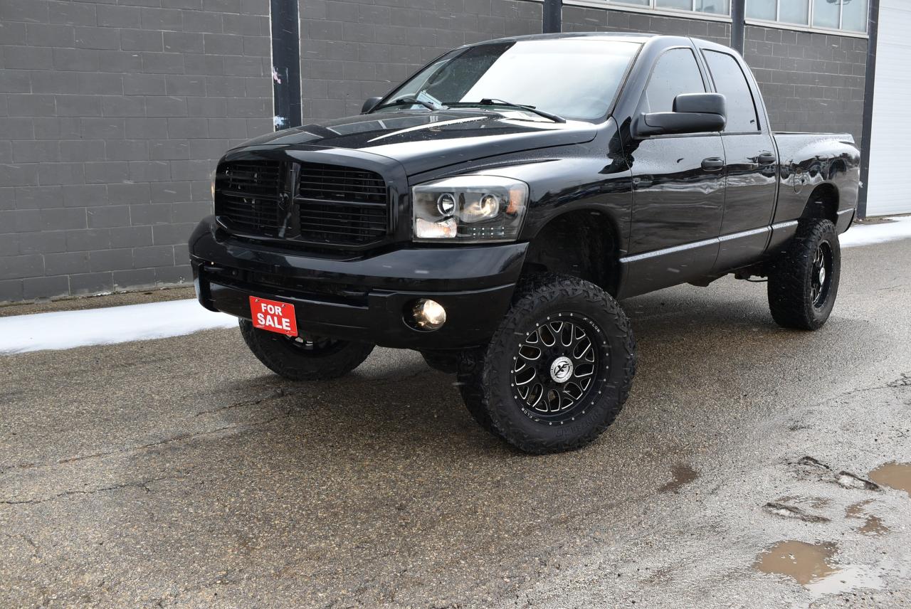 2006 Dodge Ram 2500 LIFTED 4dr Quad Cab 140.5" WB 4WD SLT