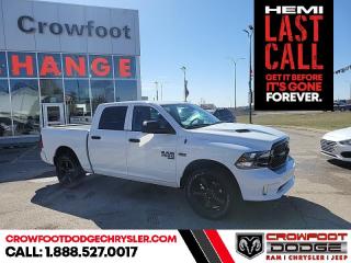 <b>Sub Zero Package, Night Edition, Wheel and Sound Group
!</b><br> <br> <br> <br>  This 2023 Ram 1500 Classic is the truck to have, thanks to its incredible powertrain and a well-appointed interior. <br> <br>The reasons why this Ram 1500 Classic stands above its well-respected competition are evident: uncompromising capability, proven commitment to safety and security, and state-of-the-art technology. From its muscular exterior to the well-trimmed interior, this 2023 Ram 1500 Classic is more than just a workhorse. Get the job done in comfort and style while getting a great value with this amazing full-size truck. <br> <br> This bright white Crew Cab 4X4 pickup   has an automatic transmission and is powered by a  395HP 5.7L 8 Cylinder Engine.<br> <br> Our 1500 Classics trim level is Express. This Ram 1500 Express features upgraded aluminum wheels, front fog lamps and USB connectivity, along with a great selection of standard features such as class II towing equipment including a hitch, wiring harness and trailer sway control, heavy-duty suspension, cargo box lighting, and a locking tailgate. Additional features include heated and power adjustable side mirrors, UCconnect 3, cruise control, air conditioning, vinyl floor lining, and a rearview camera. This vehicle has been upgraded with the following features: Sub Zero Package, Night Edition, Wheel And Sound Group
. <br><br> <br>To apply right now for financing use this link : <a href=https://www.crowfootdodgechrysler.com/tools/autoverify/finance.htm target=_blank>https://www.crowfootdodgechrysler.com/tools/autoverify/finance.htm</a><br><br> <br/> Total  cash rebate of $13551 is reflected in the price. Credit includes up to 20% MSRP. <br> Buy this vehicle now for the lowest bi-weekly payment of <b>$334.39</b> with $0 down for 96 months @ 6.49% APR O.A.C. ( Plus GST  documentation fee    / Total Obligation of $69554  ).  Incentives expire 2024-02-29.  See dealer for details. <br> <br>We pride ourselves in consistently exceeding our customers expectations. Please dont hesitate to give us a call.<br> Come by and check out our fleet of 80+ used cars and trucks and 180+ new cars and trucks for sale in Calgary.  o~o