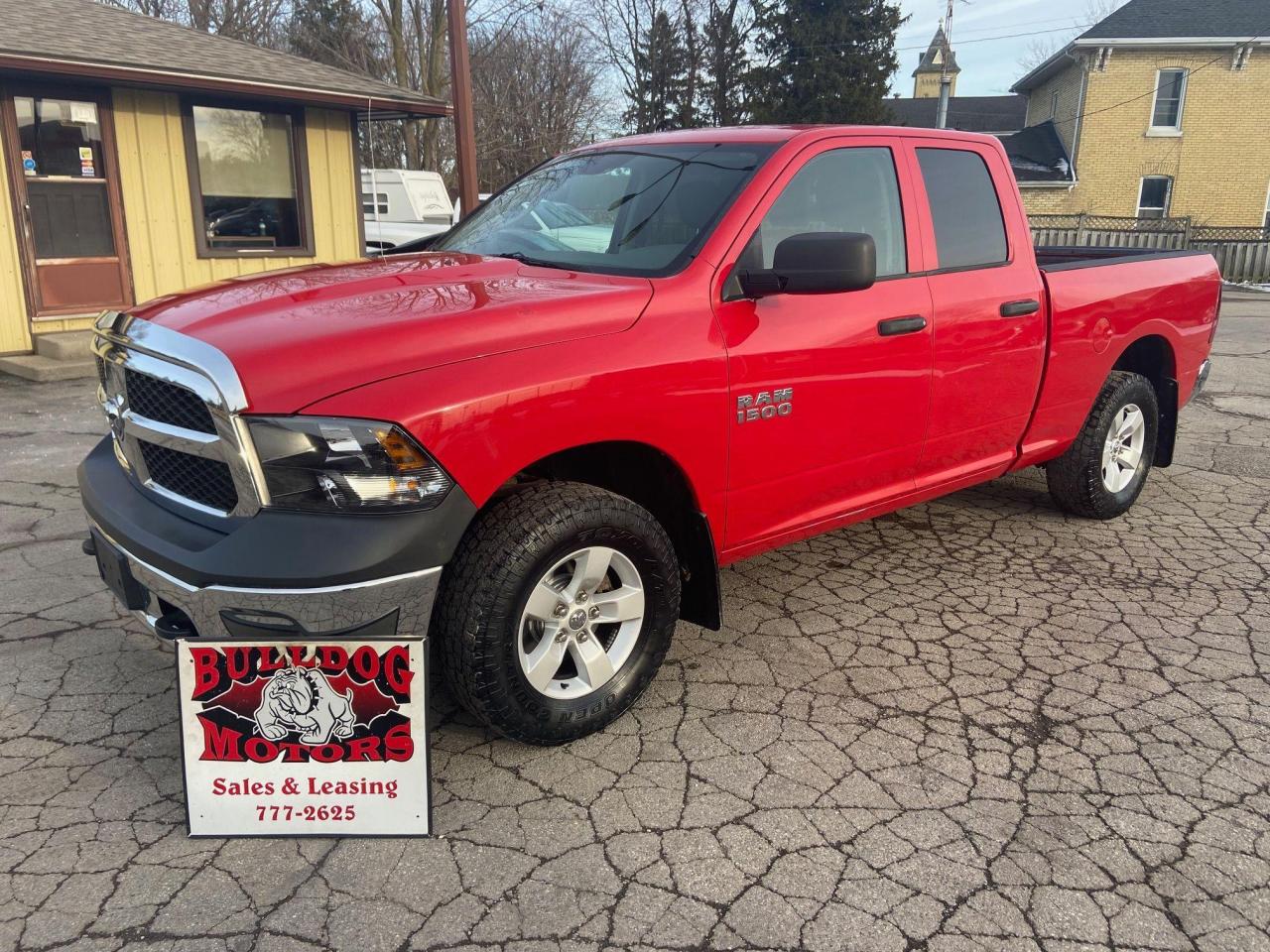 2014 RAM 1500 4WD QUAD CAB 140.5" ST