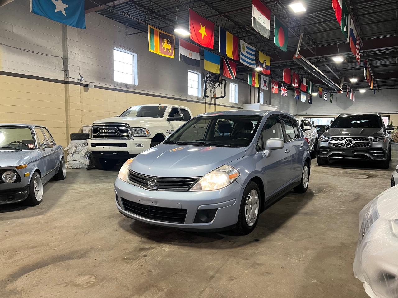 2011 Nissan Versa 5dr HB I4 Auto 1.8 S - Photo #1