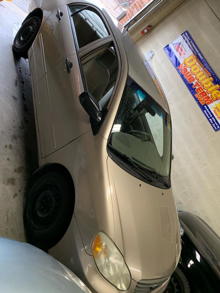 2004 Toyota Corolla 4DR SDN CE AUTO Photo2