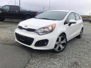 Low Mileage!
  On Sale! Save $835 on this one, weve marked it down from $20723.   While there are no major changes for this years Kia Rio, it is still one of the most competitive compacts with excellent fuel efficiency and acceleration. This  2015 Kia Rio is for sale today in Mission. 
Rios aggressive front-end styling, coupe-like roofline and muscular rear flanks express a sense of urgency, command and movement. This low mileage  hatchback has just 66,504 kms. Its  polar in colour  . It has a 6 speed automatic transmission and is powered by a  138HP 1.6L 4 Cylinder Engine.  It may have some remaining factory warranty, please check with dealer for details. 
 Our Rios trim level is SX. One of the better equipped in the range, this Kia Rio SX comes standard with multiple options that include rain detecting wipers, front fog lamps, 6 speaker stereo with Bluetooth and SUB connectivity, heated front bucket seats, a heated leather and metal look steering wheel, remote keyless entry, proximity entry, push button start, cruise control, automatic air conditioning, leather upholstered seats, a rear view camera and much more.
To apply right now for financing use this link : http://www.pioneerpreowned.com/financing/index.htm
Pioneer Pre-Owned has more than 60 years of experience in the automotive domain in B.C. backing it up, and we are proud to be your first-choice used car dealer in Mission! Buying a vehicle can be a stressful time. WE CAN HELP make it worry free and easy. How is this worry free? Our team of highly trained Auto Technicians do a full safety inspection on each vehicle. Our vehicles come with a Complete Car-proof Report and lien search history. We can deliver straight to your door or we can provide a free hotel if you so choose to come to us. We service BC, Alberta and Saskatchewan. Do you have credit issues? We know that bad things happen to good people. We all have a past, if yours is preventing you from moving forward WE CAN HELP rebuild you credit. Are you a first-time buyer, a new Canadian resident on a work permit? Is a current bankruptcy or recently discharged, past repossessions or just started a new job holding you back? TOUGH CREDIT, NO CREDIT, or GOOD CREDIT. Are your current payments to high? Do you like the vehicle you have now, but would love to lower your payments? Refinancing is Available. Need Extra cash? As an authorized representative for over 18 financial institutions and lenders. We can offer up to $15000.00 cash back and NO PAYMENTS for up to 90 days OAC. We have 0 down financing and low interest rates available. All vehicles are subject to a $695 dealer documentation fee and finance placement fee. Visit our website @ www.pioneerpreowned.com and lets us be your credit Specialists! o~o