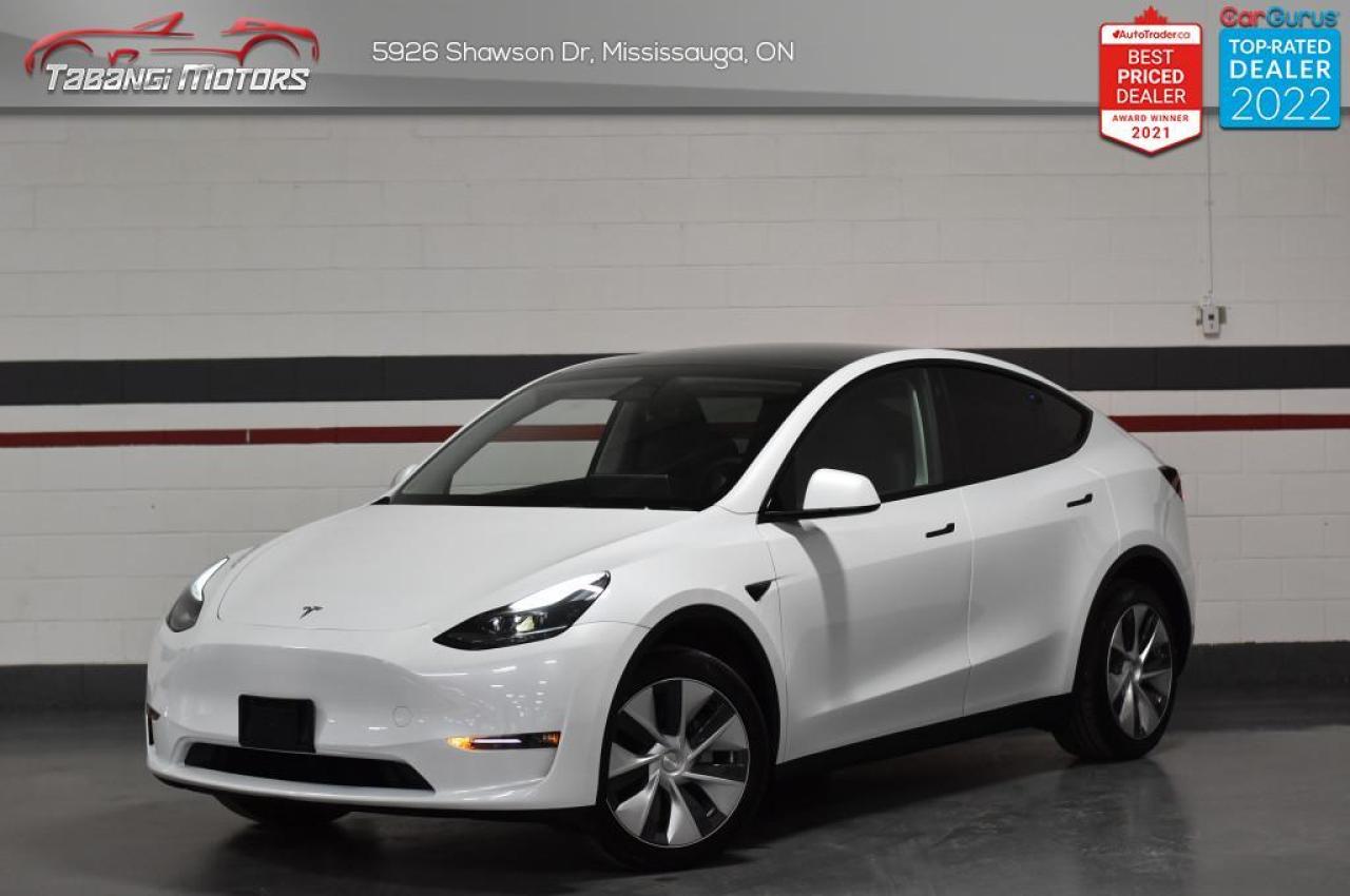 Photo of White 2023 Tesla Model Y