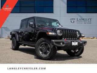 <p><strong><span style=font-family:Arial; font-size:16px;>Embodied in elegance and crafted for the discerning driver, behold the 2023 Jeep Gladiator Rubicon - a revolution in automotive excellence..</span></strong></p> <p><strong><span style=font-family:Arial; font-size:16px;>This brand-new pickup, showcased in a stunning black exterior with a matching black interior, is a testament to Jeeps unparalleled commitment to quality and innovation..</span></strong> <br> At Langley Chrysler, we believe that your vehicle should be more than just a means of transportation.. It should be an extension of your personality, a symbol of your lifestyle, and a testament to your impeccable taste.</p> <p><strong><span style=font-family:Arial; font-size:16px;>The 2023 Jeep Gladiator Rubicon is all that and more..</span></strong> <br> Equipped with a robust 3.6L 6-cylinder engine and an 8-speed automatic transmission, this vehicle is designed to conquer roads less traveled while ensuring a smooth and comfortable ride.. Its cutting-edge features such as traction control, navigation system, tachometer, and compass, ensure a driving experience thats as safe as it is enjoyable.</p> <p><strong><span style=font-family:Arial; font-size:16px;>The Gladiator Rubicons luxurious black interior is not only visually stunning but also packed with an array of comfort features..</span></strong> <br> Indulge in the plush premium cloth seats, revel in the convenience of power windows and steering, and stay in control with steering wheel-mounted audio controls.. Moreover, the crew cab configuration offers ample space for your crew and cargo.</p> <p><strong><span style=font-family:Arial; font-size:16px;>In addition to its impressive capabilities, the Gladiator Rubicon also boasts of world-class safety features..</span></strong> <br> This includes ABS brakes, dual front impact airbags, and electronic stability, among others.. The integrated roll-over protection and ignition disable feature provide that extra peace of mind.</p> <p><strong><span style=font-family:Arial; font-size:16px;>At Langley Chrysler, we believe in not just selling cars but in creating memorable buying experiences..</span></strong> <br> We want you to love buying your car as much as you love driving it.. Our friendly and knowledgeable team will guide you through the entire purchasing process, ensuring a smooth and hassle-free experience.</p> <p><strong><span style=font-family:Arial; font-size:16px;>Thought of the day: The road to success is always under construction..</span></strong> <br> Forge your path with the 2023 Jeep Gladiator Rubicon. Remember, this isnt just a vehicle; its your next adventure waiting to unfold.. Visit us at Langley Chrysler and discover the exceptional 2023 Jeep Gladiator Rubicon today.</p> <p><strong><span style=font-family:Arial; font-size:16px;>Please note the vehicle is brand new, and it has never been driven.</span></strong></p>.Documentation Fee $968, Finance Placement $628, Safety & Convenience Warranty $699

<p>*All prices are net of all manufacturer incentives and/or rebates and are subject to change by the manufacturer without notice. All prices plus applicable taxes, applicable environmental recovery charges, documentation of $599 and full tank of fuel surcharge of $76 if a full tank is chosen.<br />Other items available that are not included in the above price:<br />Tire & Rim Protection and Key fob insurance starting from $599<br />Service contracts (extended warranties) for up to 7 years and 200,000 kms starting from $599<br />Custom vehicle accessory packages, mudflaps and deflectors, tire and rim packages, lift kits, exhaust kits and tonneau covers, canopies and much more that can be added to your payment at time of purchase<br />Undercoating, rust modules, and full protection packages starting from $199<br />Flexible life, disability and critical illness insurances to protect portions of or the entire length of vehicle loan?im?im<br />Financing Fee of $500 when applicable<br />Prices shown are determined using the largest available rebates and incentives and may not qualify for special APR finance offers. See dealer for details. This is a limited time offer.</p>
