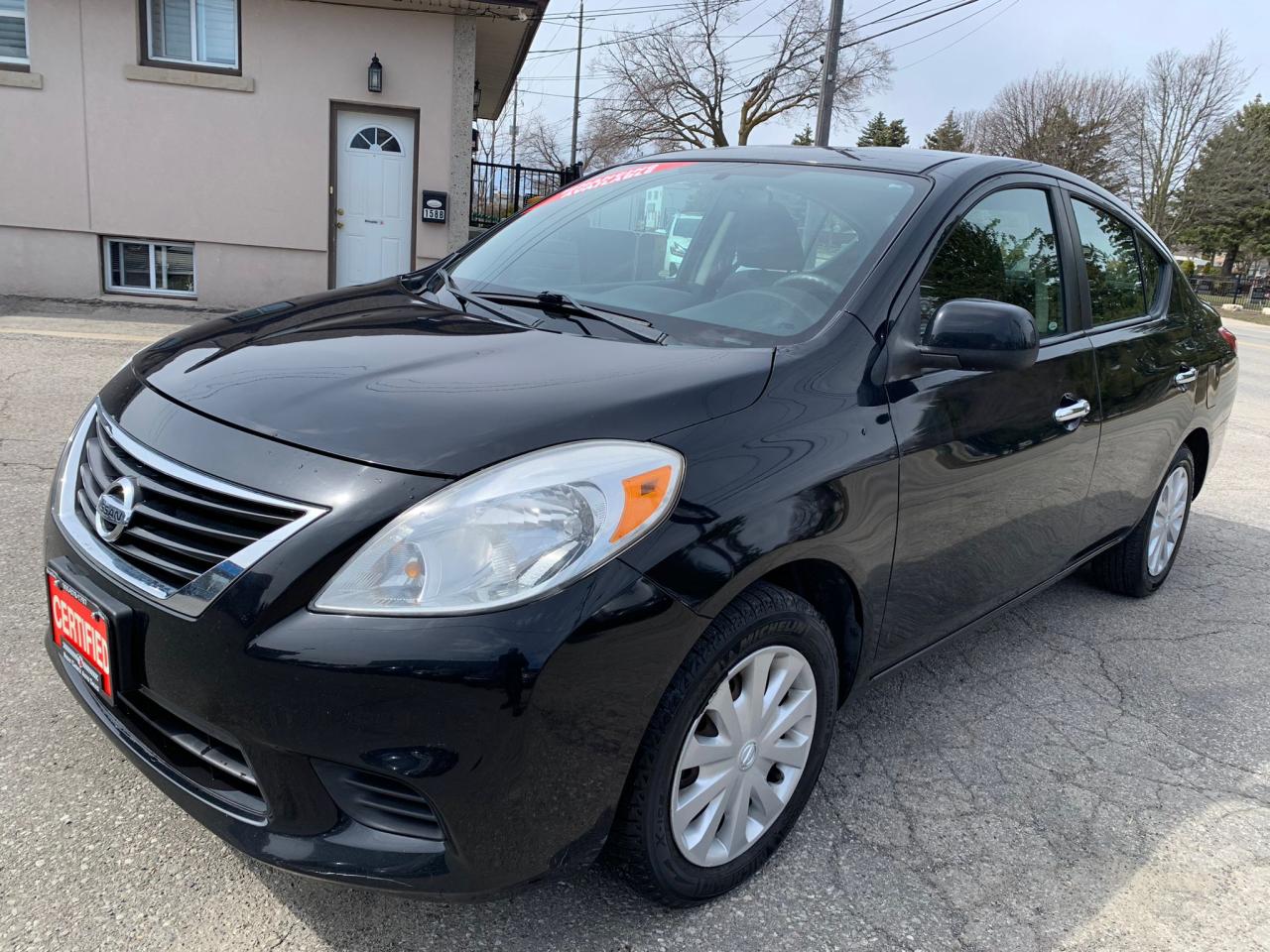 2012 Nissan Versa 4dr Sdn CVT 1.6 SV - Photo #1