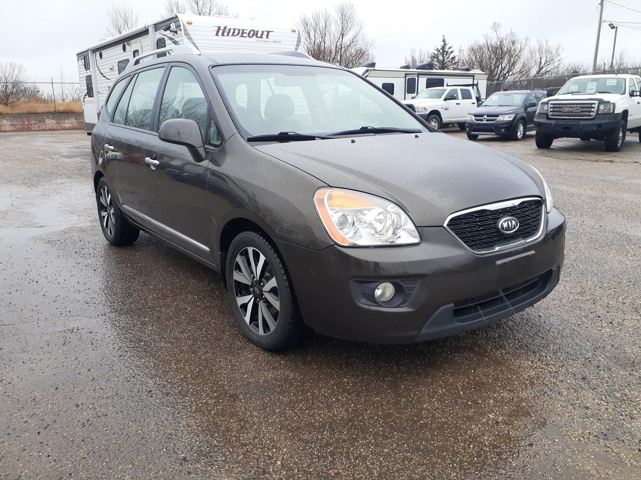 2012 Kia Rondo 7P,EX, Lther, Nav,DVD,Bu Cam,Remote,Sunroof, Htd - Photo #1