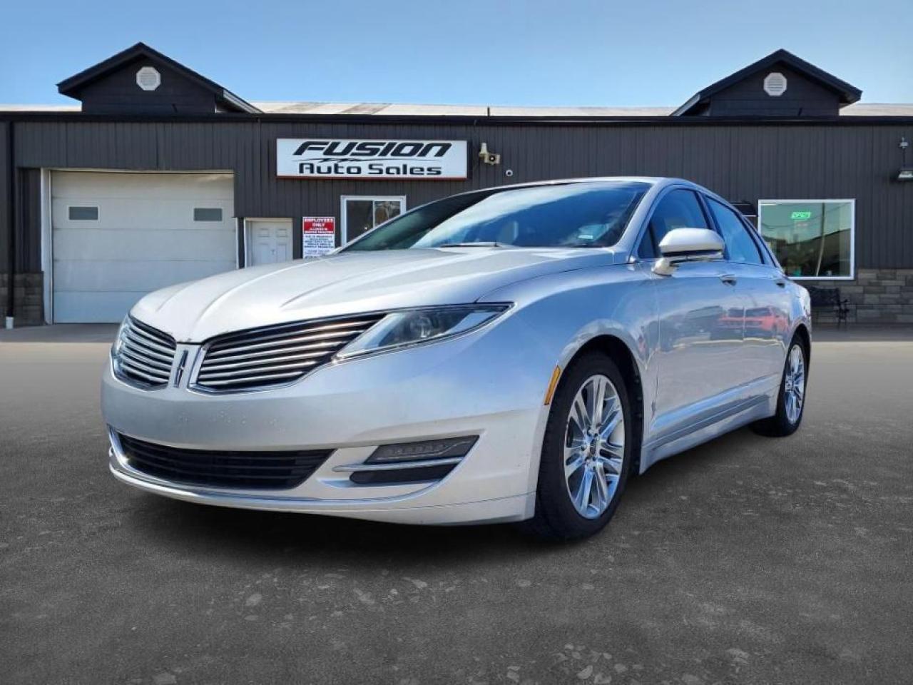 <p>2.0L 4Cyl EcoBoost, Auto, FWD, Low Low km for the Year, Remote Start,  Leather Interior with Heated Seats, Touch Screen, Power Seats, Alloy Wheels, Sat. Radio, Information System, Audio Steering Wheel Controls and more. Lic & HST Extra.</p><p style=box-sizing: border-box; --tw-border-spacing-x: 0; --tw-border-spacing-y: 0; --tw-translate-x: 0; --tw-translate-y: 0; --tw-rotate: 0; --tw-skew-x: 0; --tw-skew-y: 0; --tw-scale-x: 1; --tw-scale-y: 1; --tw-scroll-snap-strictness: proximity; --tw-ring-offset-width: 0px; --tw-ring-offset-color: #fff; --tw-ring-color: rgb(59 130 246 / 0.5); --tw-ring-offset-shadow: 0 0 #0000; --tw-ring-shadow: 0 0 #0000; --tw-shadow: 0 0 #0000; --tw-shadow-colored: 0 0 #0000; margin: 0px 0px 1.25em; color: #374151; font-family: Inter, ui-sans-serif, system-ui, sans-serif, Apple Color Emoji, Segoe UI Emoji, Segoe UI Symbol, Noto Color Emoji; font-size: 14px; background-color: #ffffff; border: 0px solid #e4e4e7;>Step into luxury with this sleek 2013 Lincoln MKZ EcoBoost, available now at Fusion Auto Sales. This silver sedan boasts a powerful 2L V4 Turbo engine paired with a smooth automatic transmission, making it both stylish and efficient. The black leather interior offers comfort and sophistication, complete with heated seats and power adjustments for the ultimate driving experience. With 94,316km on the odometer, this MKZ is ready for many more adventures.</p><p style=box-sizing: border-box; --tw-border-spacing-x: 0; --tw-border-spacing-y: 0; --tw-translate-x: 0; --tw-translate-y: 0; --tw-rotate: 0; --tw-skew-x: 0; --tw-skew-y: 0; --tw-scale-x: 1; --tw-scale-y: 1; --tw-scroll-snap-strictness: proximity; --tw-ring-offset-width: 0px; --tw-ring-offset-color: #fff; --tw-ring-color: rgb(59 130 246 / 0.5); --tw-ring-offset-shadow: 0 0 #0000; --tw-ring-shadow: 0 0 #0000; --tw-shadow: 0 0 #0000; --tw-shadow-colored: 0 0 #0000; margin: 1.25em 0px; color: #374151; font-family: Inter, ui-sans-serif, system-ui, sans-serif, Apple Color Emoji, Segoe UI Emoji, Segoe UI Symbol, Noto Color Emoji; font-size: 14px; background-color: #ffffff; border: 0px solid #e4e4e7;>This well-equipped MKZ comes packed with features that enhance both comfort and safety. Enjoy the convenience of remote start on those chilly Canadian mornings, and stay connected with Bluetooth connectivity and a premium sound system. The blind spot monitor adds an extra layer of security, while the rearview camera provides peace of mind when reversing. Cruise control makes highway driving a breeze, and the heated mirrors ensure clear visibility even on the coldest days.</p><p style=box-sizing: border-box; --tw-border-spacing-x: 0; --tw-border-spacing-y: 0; --tw-translate-x: 0; --tw-translate-y: 0; --tw-rotate: 0; --tw-skew-x: 0; --tw-skew-y: 0; --tw-scale-x: 1; --tw-scale-y: 1; --tw-scroll-snap-strictness: proximity; --tw-ring-offset-width: 0px; --tw-ring-offset-color: #fff; --tw-ring-color: rgb(59 130 246 / 0.5); --tw-ring-offset-shadow: 0 0 #0000; --tw-ring-shadow: 0 0 #0000; --tw-shadow: 0 0 #0000; --tw-shadow-colored: 0 0 #0000; margin: 1.25em 0px; color: #374151; font-family: Inter, ui-sans-serif, system-ui, sans-serif, Apple Color Emoji, Segoe UI Emoji, Segoe UI Symbol, Noto Color Emoji; font-size: 14px; background-color: #ffffff; border: 0px solid #e4e4e7;>Come visit Fusion Auto Sales today and experience the luxury and performance of this 2013 Lincoln MKZ EcoBoost. With its impressive features and sleek design, this sedan is sure to impress.</p><p>The Fusion Philosophy<br /><br />At Fusion Auto Sales, we put more effort into buying our vehicles than we do trying to sell them. By constantly monitoring what other car lots are doing, we strive to be the lowest priced dealer in our market. We won’t purchase a vehicle to “fill a hole”. We know that the vehicles on our lot are great value for the money and smart shoppers realize that also. Adhering to this philosophy makes it easy for our customers. If they find a vehicle on our lot that fulfills their needs and wants, they know that they’re getting great value. <br /><br />If we don’t have what you’re looking for, we can find it! Over 150 customers have saved thousands of dollars buy joining our” locate club”. People that know what they want and what they want to pay (within reason of course), get the vehicle of their dreams and enjoy huge savings. Contact us for details.<br /><br /><br /><br />Fusion Auto Sales is in Tilbury, Ont. located between Windsor and London right off the 401. We are among 7 dealerships within a &frac12; kilometer distance which is great for out of town shoppers. We began satisfying customers in 2009 and have been doing so ever since. In 2012 Fusion was recognized as 1 of the 50 fastest growing companies in Canada. And then, in 2018, we were named one of the top 5 independent automobile dealerships in the country. <br /><br />We specialize in late model vehicles at below than average pricing, everything is fully certified and every unit is Car Proof verified and is fully disclosed with every unit. We offer every type of financing from perfect credit at great rates to credit challenges with competitive rates. We also specialize in locating vehicles for customers, we cant have everything on the lot so if you do not see it and are having a hard time finding what you are looking for, let us know and we can find it for you. Fusion Auto Sales spans its customer base from Windsor all the way to Timmins, On and every where in between. Our philosophy is You are going to like the way we deal and everyone does, straight honest answers with no monkey business and no back and forth between sales and managers.</p><p> </p>
