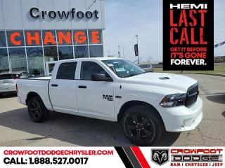 <b>Sub Zero Package, Night Edition, Wheel and Sound Group
, Trailer Hitch!</b><br> <br> <br> <br>  This Ram 1500 Classic is a top contender in the full-size pickup segment thanks to a winning combination of a strong powertrain, a smooth ride and a well-trimmed cabin. <br> <br>The reasons why this Ram 1500 Classic stands above its well-respected competition are evident: uncompromising capability, proven commitment to safety and security, and state-of-the-art technology. From its muscular exterior to the well-trimmed interior, this 2023 Ram 1500 Classic is more than just a workhorse. Get the job done in comfort and style while getting a great value with this amazing full-size truck. <br> <br> This bright white Crew Cab 4X4 pickup   has an automatic transmission and is powered by a  395HP 5.7L 8 Cylinder Engine.<br> <br> Our 1500 Classics trim level is Express. This Ram 1500 Express features upgraded aluminum wheels, front fog lamps and USB connectivity, along with a great selection of standard features such as class II towing equipment including a hitch, wiring harness and trailer sway control, heavy-duty suspension, cargo box lighting, and a locking tailgate. Additional features include heated and power adjustable side mirrors, UCconnect 3, cruise control, air conditioning, vinyl floor lining, and a rearview camera. This vehicle has been upgraded with the following features: Sub Zero Package, Night Edition, Wheel And Sound Group
, Trailer Hitch. <br><br> <br>To apply right now for financing use this link : <a href=https://www.crowfootdodgechrysler.com/tools/autoverify/finance.htm target=_blank>https://www.crowfootdodgechrysler.com/tools/autoverify/finance.htm</a><br><br> <br/> Total  cash rebate of $13654 is reflected in the price. Credit includes up to 20% MSRP. <br> Buy this vehicle now for the lowest bi-weekly payment of <b>$336.93</b> with $0 down for 96 months @ 6.49% APR O.A.C. ( Plus GST  documentation fee    / Total Obligation of $70082  ).  Incentives expire 2024-02-29.  See dealer for details. <br> <br>We pride ourselves in consistently exceeding our customers expectations. Please dont hesitate to give us a call.<br> Come by and check out our fleet of 80+ used cars and trucks and 180+ new cars and trucks for sale in Calgary.  o~o