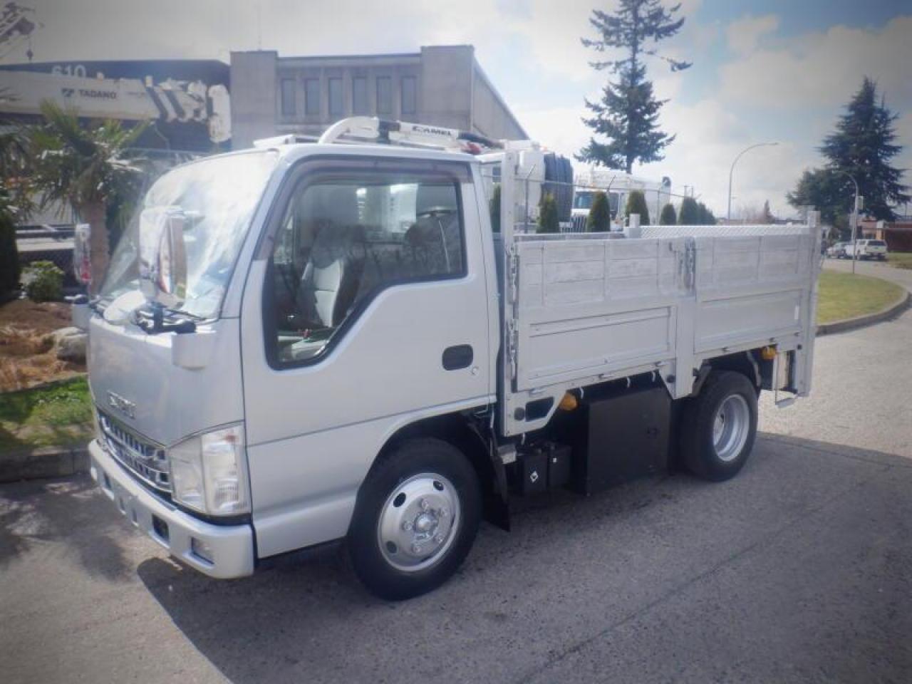 Used 2008 Isuzu ELF 10 Foot Flat Deck with Power Tailgate Right Hand Drive Diesel for sale in Burnaby, BC