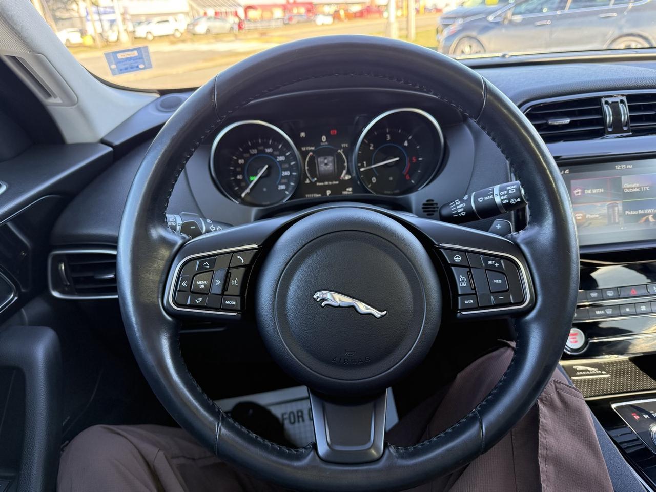 9857693