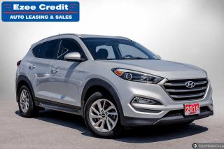 <p>Ezee Credit has been awarded the Consumers Choice Award for 8 years in a row! Buy with confidence and check out our online reviews on Google or Facebook. Call us now to book your test drive! (888) 499 8849.</p><p>Recent Arrival! 2016 Hyundai Tucson SE AWD, ABS brakes, Air Conditioning, Dual front impact airbags, Dual front side impact airbags, Exterior Parking Camera Rear, Front anti-roll bar, Fully automatic headlights, Heated door mirrors, Low tire pressure warning, Occupant sensing airbag, Power door mirrors, Power steering, Power windows, Radio: Autonet AM/FM/SiriusXM/CD/MP3 Audio System, Rear window defroster, Rear window wiper, Remote keyless entry, Security system, Speed control, Speed-sensing steering, Steering wheel mounted audio controls, Telescoping steering wheel, Tilt steering wheel, Traction control. Odometer is 73926 kilometers below market average!</p><p>Reviews:</p><p>  * Most owners say this era of Tucson attracted their attention with unique exterior styling, and sealed the deal with a great balance of comfortable ride quality and sporty, spirited driving dynamics. Bang-for-the-buck was highly rated as well. Source: autoTRADER.ca</p><p>At Ezee Credit, our EzeeWay program provides affordable financing on a vehicle YOU chose. Your credit situation DOES - NOT - MATTER; bankruptcies, new or self-employment, disability, child tax credit and hard to prove income - Our EzeeWay program is designed to help clean up your credit while you drive a vehicle you can be proud of. Every EzeeWay certified vehicle undergoes a comprehensive inspection by Certified Technicians. We know that reducing the possibility of unexpected repair costs makes it easier for you to manage your payments and re-establish your credit. Not to mention all EzeeWay certified vehicles are accompanied by a CarFax Report.</p>