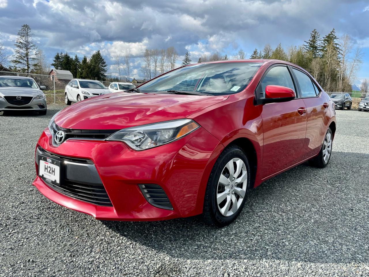 2016 Toyota Corolla 4dr Sdn CVT LE Photo0