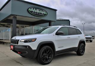 <p style=text-align: center;><em><strong><span style=font-size: 18pt; font-family: arial, helvetica, sans-serif;>2021 JEEP CHEROKEE </span></strong></em><span style=font-family: arial, helvetica, sans-serif;><span style=font-size: 24px;><strong><em>TRAILHAWK® ELITE</em></strong></span></span><em><strong><span style=font-size: 18pt; font-family: arial, helvetica, sans-serif;> 4X4.</span></strong></em></p><p style=text-align: center;><span style=color: #000000;><span style=font-family: arial, helvetica, sans-serif;><span style=font-size: 18.6667px;><strong>3.2L PENTASTAR<span style=font-size: 10pt;><sup>TM</sup></span> V6 ENGINE w/ ENGINE STOP/START<em> (ESS) </em>TECHNOLOGY.</strong></span></span></span></p><p style=text-align: center;><span style=color: #000000;><span style=font-family: arial, helvetica, sans-serif;><strong><span style=font-size: 14pt;>9-Speed Automatic Transmission w/<em>Active Drive II.</em></span></strong></span></span></p><p style=text-align: center;><span style=color: #000000;><span style=font-family: arial, helvetica, sans-serif;><span style=font-size: 18.6667px;><strong>Jeep</strong></span></span><em><span style=font-family: arial, helvetica, sans-serif;><span style=font-size: 18.6667px;><strong>®</strong></span></span></em><span style=font-family: arial, helvetica, sans-serif;><span style=font-size: 18.6667px;><strong> 4X4 System w/ Trail Rated® Active Drive Lock System.</strong></span></span></span></p><p style=text-align: center;><span style=color: #000000;><span style=font-family: arial, helvetica, sans-serif;><span style=font-size: 18.6667px;><strong> - </strong><em>Includes;</em> </span></span><span style=font-family: arial, helvetica, sans-serif;><span style=font-size: 18.6667px;>A Two-Speed Power Transfer Unit <em>(PTU)</em> that </span></span><span style=font-family: arial, helvetica, sans-serif;><span style=font-size: 18.6667px;>offers Torque Management & 4WD </span></span><span style=font-family: arial, helvetica, sans-serif;><span style=font-size: 18.6667px;>Low Mode. </span></span></span></p><p style=text-align: center;><span style=color: #000000;><em><span style=font-family: arial, helvetica, sans-serif;><strong><span style=font-size: 14pt;>Selec-Terrain</span></strong></span><span style=font-family: arial, helvetica, sans-serif;><span style=font-size: 18.6667px;><strong>®</strong></span></span></em><strong style=font-family: arial, helvetica, sans-serif;><span style=font-size: 14pt;> Traction Management System.</span></strong></span></p><p style=text-align: center;><span style=color: #000000;><strong style=font-family: arial, helvetica, sans-serif;><span style=font-size: 14pt;> - </span></strong><span style=font-family: arial, helvetica, sans-serif;><span style=font-size: 14pt;><em>Includes;</em></span></span><span style=font-family: arial, helvetica, sans-serif;><span style=font-size: 14pt;> </span></span><span style=font-family: arial, helvetica, sans-serif;><span style=font-size: 18.6667px;>AUTO, SNOW, SPORT, SAND/MUD, & ROCK MODE.</span></span></span></p><p style=text-align: center;><span style=color: #000000;><span style=font-family: arial, helvetica, sans-serif;><span style=font-size: 18.6667px;><strong>17 Painted Black Off-Road Aluminum Wheels</strong></span></span><strong style=font-family: arial, helvetica, sans-serif;><span style=font-size: 14pt;> w/ P</span></strong><span style=font-family: arial, helvetica, sans-serif;><span style=font-size: 18.6667px;><strong>245/65R17 All-Terrain Tires.</strong></span></span></span></p><p style=text-align: center;><span style=color: #000000;><strong style=font-family: arial, helvetica, sans-serif; font-size: 14pt;><span style=font-size: 18pt;>OPTIONAL EQUIPMENT</span></strong><span style=font-family: arial, helvetica, sans-serif; font-size: 14pt;> </span><em style=font-family: arial, helvetica, sans-serif; font-size: 14pt;><strong>(May Replace Standard Equipment)</strong></em></span></p><p style=text-align: center;><span style=font-size: 18pt; font-family: arial, helvetica, sans-serif;><em><strong>TRAILHAWK</strong></em></span><span style=font-family: arial, helvetica, sans-serif;><span style=font-size: 24px;><strong><em>®</em></strong></span></span><em style=font-family: arial, helvetica, sans-serif; font-size: 18pt;><strong> - </strong></em><span style=font-family: arial, helvetica, sans-serif; font-size: 18pt;><strong>ELITE </strong></span><span style=font-family: arial, helvetica, sans-serif;><span style=font-size: 24px;><strong>PREFERRED PACKAGE 27L</strong></span></span></p><p style=text-align: center;><span style=font-size: 14pt; font-family: arial, helvetica, sans-serif;>Ventilated </span><span style=font-family: arial, helvetica, sans-serif; font-size: 18.6667px;>Nappa</span><span style=font-family: arial, helvetica, sans-serif; font-size: 18.6667px;> </span><span style=font-family: arial, helvetica, sans-serif; font-size: 18.6667px;>Leather-Faced </span><span style=font-family: arial, helvetica, sans-serif; font-size: 18.6667px;>Front Bucket Seats </span><span style=font-family: arial, helvetica, sans-serif; font-size: 14pt;>w/ Ruby-Red Accent Stitching & Embroidered Trailhawk</span><em style=font-size: 18.6667px; font-family: arial, helvetica, sans-serif;>® </em><span style=font-size: 18.6667px; font-family: arial, helvetica, sans-serif;>L</span><span style=font-family: arial, helvetica, sans-serif; font-size: 14pt;>ogo, Front Ventilated Seats, </span><span style=font-family: arial, helvetica, sans-serif; font-size: 18.6667px;>Power Driver & Front Passenger Seats, Power 4-way Driver & Passenger Lumbar Adjust, </span><span style=font-family: arial, helvetica, sans-serif; font-size: 14pt;>Memory Settings (Radio, Driver Seat & Mirrors).</span></p><p style=text-align: center;><span style=font-family: arial, helvetica, sans-serif; font-size: 18.6667px;>17 Black Aluminum Wheels, Hands-Free Power Liftgate,</span><span style=font-family: arial, helvetica, sans-serif; font-size: 18.6667px;> </span><span style=font-family: arial, helvetica, sans-serif; font-size: 18.6667px;>Auto-Dimming Rearview Mirror, </span><span style=font-family: arial, helvetica, sans-serif; font-size: 14pt;>Security Alarm, Universal Garage Door Opener, 50 State Emissions.</span></p><p style=text-align: center;><strong><span style=font-size: 18pt; font-family: arial, helvetica, sans-serif;>*TECHNOLOGY GROUP*</span></strong></p><p style=text-align: center;><span style=font-size: 14pt; font-family: arial, helvetica, sans-serif;>Adaptive Cruise Control w/Stop & Go, Side Distance Warning, </span><span style=font-size: 14pt; font-family: arial, helvetica, sans-serif;>Parallel & Perpendicular Park-Assist, </span><span style=font-size: 14pt; font-family: arial, helvetica, sans-serif;>Forward Collision Warning w/Active Braking, </span><span style=font-size: 14pt; font-family: arial, helvetica, sans-serif;>Advanced Brake Assist, </span><span style=font-size: 14pt; font-family: arial, helvetica, sans-serif;>Lane Departure Warning w/Lane Keep Assist, </span><span style=font-size: 14pt; font-family: arial, helvetica, sans-serif;>Automatic High-Beam Headlamp Control.</span></p><p style=text-align: center;><span style=font-size: 18pt;><strong><span style=font-family: arial, helvetica, sans-serif;>*TRAILER TOW GROUP*</span></strong></span></p><p style=text-align: center;><span style=font-size: 14pt; font-family: arial, helvetica, sans-serif;>Trailer Tow Wiring Harness, </span><span style=font-size: 14pt; font-family: arial, helvetica, sans-serif;>4-& 7-Pin Wiring Harness, </span><span style=font-size: 14pt; font-family: arial, helvetica, sans-serif;>Class-III Hitch Receiver.</span></p><p style=text-align: center;><span style=font-size: 18pt;><strong><span style=font-family: arial, helvetica, sans-serif;>*SUN & SOUND GROUP*</span></strong></span></p><p style=text-align: center;><span style=font-size: 14pt;><span style=font-family: arial, helvetica, sans-serif;>This Group Pairs; <em>CommandView®</em> Dual-Pane Panoramic Sunroof w/</span><em style=font-family: arial, helvetica, sans-serif;>Alpine® </em><span style=font-family: arial, helvetica, sans-serif;>9-Speaker Premium Sound System for a </span><span style=font-family: arial, helvetica, sans-serif;>truly immersive driving experience.</span></span></p><p style=text-align: center;><span style=font-size: 18pt;><strong><span style=font-family: arial, helvetica, sans-serif;>*<em>UCONNECT</em></span></strong></span><em><span style=font-family: arial, helvetica, sans-serif;><span style=font-size: 24px;><strong>®</strong></span></span></em><span style=font-size: 18pt;><strong><span style=font-family: arial, helvetica, sans-serif;> 4C NAV w/8.4 DISPLAY*</span></strong></span></p><p style=text-align: center;><span style=font-size: 14pt; font-family: arial, helvetica, sans-serif;>GPS Navigation, 4G LTE Wi-Fi® Hot Spot, SiriusXM® Guardian, SiriusXM® Travel Link, SiriusXM® Traffic, Off-Road Information Pages.</span></p><p style=text-align: center;><em><span style=font-family: arial, helvetica, sans-serif;><span style=font-family: arial, helvetica, sans-serif;><span style=font-size: 18.6667px;>- SIRIUSXM</span></span><span style=font-size: 18.6667px;>®</span><span style=font-size: 18.6667px;> GUARDIAN SERVICES + UCONNECT® APP; </span></span></em></p><p style=text-align: center;><span style=font-family: arial, helvetica, sans-serif;><span style=font-size: 18.6667px;>(</span></span><span style=font-family: arial, helvetica, sans-serif;><span style=font-family: arial, helvetica, sans-serif;><span style=font-size: 18.6667px;><em>INCLUDES; </em>SOS CALL,</span></span><span style=font-family: arial, helvetica, sans-serif;><span style=font-size: 18.6667px;> ROADSIDE ASSISTANCE CALL, </span></span><span style=font-family: arial, helvetica, sans-serif;><span style=font-size: 18.6667px;>LOCK/UNLOCK,</span></span><span style=font-family: arial, helvetica, sans-serif;><span style=font-size: 18.6667px;> START YOUR CAR REMOTELY, </span></span><span style=font-family: arial, helvetica, sans-serif;><span style=font-size: 18.6667px;>FLASH THE LIGHTS, </span></span><span style=font-family: arial, helvetica, sans-serif;><span style=font-size: 18.6667px;>VEHICLE FINDER, </span></span><span style=font-family: arial, helvetica, sans-serif;><span style=font-size: 18.6667px;>SEND & GO, </span></span><span style=font-family: arial, helvetica, sans-serif;><span style=font-size: 18.6667px;>THEFT ALARM NOTIFICATION,</span></span><span style=font-family: arial, helvetica, sans-serif;><span style=font-size: 18.6667px;> STOLEN VEHICLE ASSISTANCE, & </span></span><span style=font-family: arial, helvetica, sans-serif;><span style=font-size: 18.6667px;>FAMILY DRIVE ALERTS.)</span></span></span></p><p style=text-align: center;><strong><span style=font-family: arial, helvetica, sans-serif; font-size: 18pt;>STANDARD EQUIPMENT <em><span style=font-size: 12pt;>(UNLESS REPLACED BY OPTIONAL EQUIPMENT ABOVE)</span></em></span></strong></p><p style=text-align: center;><em><strong><span style=font-family: arial, helvetica, sans-serif; font-size: 18pt;>FUNCTIONAL / SAFETY FEATURES</span></strong></em></p><p style=text-align: center;><span style=font-size: 14pt; font-family: arial, helvetica, sans-serif;>Jeep Active Drive Lock, Selec-Terrain Traction Management System, Electronic Stability Control, Hill Start Assist, Hill Descent Control, Selec-Speed Control, Tire Fill Alert, Capless Fuel-Filler, 4-W</span><span style=font-size: 14pt; font-family: arial, helvetica, sans-serif;>heel Anti-Lock Disc Brakes, ParkView® Rear Back-Up Camera, Park-Sense® Rear Park-Assist System, Blind-Spot Monitoring & Rear Cross-Path Detection, Rain-Sensing Windshield Wipers, Supplemental Drivers Knee Blocker Air Bag, Supplemental Passengers Knee Blocker Air Bag, Advanced Multistage Front Air Bags, Supplemental Front Seat-mounted Side Air Bags, Supplemental Side Curtain Air Bags, Child Seat Anchor System - LATCH Ready, </span></p><p style=text-align: center;><span style=font-size: 14pt; font-family: arial, helvetica, sans-serif;>Front Heated Seats, Heated Steering Wheel, Remote Start System, All-Weather Floor Mats, Windshield Wiper De-Icer, Push-Button Start, Remote Proximity Keyless Entry, <em>SentryKey® </em>Antitheft Engine Immobilizer, Keyless Entry w/Panic Alarm, A/C w/Dual-Zone Automatic Temperature Control, 7 Full-Colour Customizable In-Cluster Display, Rear Dual USB Charging Ports, 115-Volt Auxiliary Power Outlet, Ambient Led Interior Lighting, Steering Wheel-Mounted Audio Controls,</span></p><p style=text-align: center;><span style=font-size: 14pt; font-family: arial, helvetica, sans-serif;>8.4 Touchscreen, <em>SiriusXM®</em> Satellite Radio, Hands-Free Communication w/Bluetooth® Streaming, Google<em> Android Auto</em><span style=font-size: 10pt;><sup>TM</sup></span> & <em>Apple CarPlay®</em> Capable.</span></p><p style=text-align: center;><em><strong><span style=font-size: 18pt;><span style=font-family: arial, helvetica, sans-serif;>EXTERIOR FEATURES</span></span></strong></em></p><p style=text-align: center;><span style=font-family: arial, helvetica, sans-serif;><span style=font-size: 18.6667px;>1 Increased Height & Rugged Lower Front &</span></span><span style=font-family: arial, helvetica, sans-serif;><span style=font-size: 18.6667px;> Rear Cladding,</span></span><span style=font-family: arial, helvetica, sans-serif;><span style=font-size: 18.6667px;> Skid Plates (Fuel Tank, Transmission, Transfer </span></span><span style=font-family: arial, helvetica, sans-serif;><span style=font-size: 18.6667px;>Case & Suspension,</span></span><span style=font-family: arial, helvetica, sans-serif;><span style=font-size: 18.6667px;> Front & Rear Signature Ruby-Red Tow Hooks,</span></span><span style=font-family: arial, helvetica, sans-serif;><span style=font-size: 18.6667px;> Black Hood Decal,</span></span><span style=font-family: arial, helvetica, sans-serif;><span style=font-size: 18.6667px;> Deep-Tint Sunscreen Glass,</span></span><span style=font-family: arial, helvetica, sans-serif;><span style=font-size: 18.6667px;> Neutral Grey Trim</span></span><span style=font-family: arial, helvetica, sans-serif;><span style=font-size: 18.6667px;>(DLO Mouldings, R</span></span><span style=font-family: arial, helvetica, sans-serif;><span style=font-size: 18.6667px;>oof Rails, Fog Lamp Bezels, Front & Rear Lower A</span></span><span style=font-family: arial, helvetica, sans-serif;><span style=font-size: 18.6667px;>ppliqués, & Grille Rings), </span></span><span style=font-family: arial, helvetica, sans-serif;><span style=font-size: 18.6667px;>LED Low/High Beam Headlamps, </span></span><span style=font-family: arial, helvetica, sans-serif; font-size: 18.6667px;>Automatic Headlamps,</span><span style=font-family: arial, helvetica, sans-serif; font-size: 18.6667px;> </span><span style=font-family: arial, helvetica, sans-serif;><span style=font-size: 18.6667px;>LED Fog Lamps & Taillamps, Power-Adjustable Heated Exterior Mirrors w/Turn Signals & Lamps, P245/65R17 All-Terrain Tires, </span></span><span style=font-family: arial, helvetica, sans-serif;><span style=font-size: 18.6667px;>Full-Size Spare Tire.</span></span></p><p style=text-align: center;><em><strong><span style=font-size: 18pt; font-family: arial, helvetica, sans-serif;>*SPECIFICATIONS*</span></strong></em></p><p style=text-align: center;><span style=font-size: 14pt;><span style=font-family: arial, helvetica, sans-serif;>271 <em>Horsepower</em> @ 6,500 rpm. <strong><em>/ </em></strong></span></span><span style=font-size: 14pt;><span style=font-family: arial, helvetica, sans-serif;>239<em> lb-ft. of </em></span><em><span style=font-family: arial, helvetica, sans-serif;>Torque</span></em><span style=font-family: arial, helvetica, sans-serif;> </span><span style=font-family: arial, helvetica, sans-serif;>@ 4,400 rpm.</span></span></p><p style=text-align: center;><span style=font-size: 14pt;><span style=font-family: arial, helvetica, sans-serif;><em><strong>HIGHWAY -</strong> </em>9.7 L/100 km. </span></span><span style=font-size: 14pt;><span style=font-family: arial, helvetica, sans-serif;><em><strong>CITY -</strong> </em>12.9 L/100 km<em>. </em></span></span><span style=font-size: 14pt;><span style=font-family: arial, helvetica, sans-serif;><em><strong>COMBINED -</strong> </em>11.5 L/100 km<em>.</em></span></span></p><p style=text-align: center;><span style=font-size: 18pt;><span style=font-family: arial, helvetica, sans-serif;><span style=font-family: arial, helvetica, sans-serif;><span style=font-size: 24px;><span style=font-size: 14pt;>3.517:1 Axle Ratio. (Only Available with Trailer Tow Group & Active Drive II).</span></span></span></span></span></p><p style=text-align: center;><span style=font-size: 18pt;><span style=font-family: arial, helvetica, sans-serif;><span style=font-size: 14pt;><span style=font-family: arial, helvetica, sans-serif;>Maximum Towing Capacity: </span><span style=font-family: arial, helvetica, sans-serif;>2041 kg. or 4500 lbs.</span></span></span></span></p><p style=text-align: center;><span style=font-size: 18pt;><span style=font-family: arial, helvetica, sans-serif;><span style=font-size: 14pt;><span style=font-family: arial, helvetica, sans-serif;>Can Handle U</span><span style=font-family: arial, helvetica, sans-serif;>p To 20 of Water Fording.</span></span></span></span></p><p style=text-align: center;><span style=font-size: 18pt;><strong><span style=font-family: arial, helvetica, sans-serif;>*Suspension Specifications*</span></strong></span></p><p style=text-align: center;><span style=font-family: arial, helvetica, sans-serif;><span style=font-size: 18.6667px;>Front MacPherson Struts, Rigid Mounted High-Strength Steel Cradle, A</span></span><span style=font-family: arial, helvetica, sans-serif;><span style=font-size: 18.6667px;>luminum Lower Control Arms & Knuckles.</span></span></p><p style=text-align: center;><span style=font-family: arial, helvetica, sans-serif;><span style=font-size: 18.6667px;>Rear 4-Link Rear Suspension w/Trailing Arm, Aluminum Spring Link &</span></span><span style=font-family: arial, helvetica, sans-serif;><span style=font-size: 18.6667px;> Isolated High-Strength Steel Rear Cradle.</span></span></p><p style=text-align: center;><em><strong><span style=font-size: 18pt;>Go Anywhere, Do Anything®.</span></strong></em></p><p style=text-align: center;><span style=font-family: arial, helvetica, sans-serif;><strong><span style=font-size: 14pt;>Here at Lanoue/Amfar Sales, Service & Leasing in Tilbury, we take pride in providing the public with a wide variety of High-Quality Pre-owned Vehicles. We recondition and certify our vehicles to a level of excellence that exceeds the Status Quo. We treat our Customers like family and provide the highest level of service from Start to Finish. If you’d like a smooth & stress-free car shopping experience, give one of our Sales Associates a call at 1-844-682-3325 to help you find your next NEW-TO-YOU vehicle!</span></strong></span></p><p style=text-align: center;><span style=font-family: arial, helvetica, sans-serif;><strong><span style=font-size: 14pt;>Although we try to take great care in being accurate with the information in this listing, from time to time, errors occur. The vehicle is priced as it is physically equipped. Minor variances will not effect pricing. Please verify the vehicle is As Expected when you visit. Thank You!</span></strong></span></p>