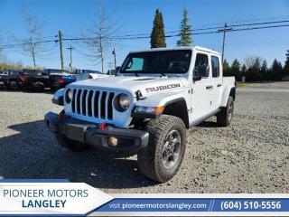 <b>Navigation,  Premium Audio,  Android Auto,  Apple CarPlay,  4G Wi-Fi!</b><br> <br> At Pioneer Motors Langley, our team of professionals will guide you to make the right choice for your future vehicle. You will be advised as to the choice of the right vehicle and the best suitable financing for your needs. <br> <br> Compare at $71390 - Pioneer value price is just $69990! <br> <br>   You no longer have to decide between a Jeep and a truck with the Jeep Gladiator. This  2022 Jeep Gladiator is fresh on our lot in Langley. <br> <br>Built with unmistakable Jeep styling and off-road capability, while bringing the utility and hauling power of a pickup truck, you get the best of both worlds with this incredible machine. Thanks to its unmistakable style, rugged off-road technology, and an exhilarating open air truck experience, this unique Jeep Gladiator is ready to change the 4X4 game. This  Regular Cab 4X4 pickup  has 25,514 kms. Its  nice in colour  . It has a 6 speed manual transmission and is powered by a  285HP 3.6L V6 Cylinder Engine. <br> <br> Our Gladiators trim level is Rubicon. With fox shocks, locking differentials, extra skid plates, incredible crawl ratios, and heavy duty suspension, you can rest assured this rock crawling Rubicon trim is more than an expensive decal. This Gladiator takes infotainment just as seriously as the trail with navigation, a premium Alpine audio system, Apple CarPlay, Android Auto, and a wi-fi hotspot offered on the Uconnect system. This truck is exactly what you want from an off-roading machine with skid plates, tow hooks, a sport bar, Dana axles, and a shift-on-the-fly transfer case while aluminum wheels make sure you do it in style. A rearview camera and fog lamps help you stay safe. This vehicle has been upgraded with the following features: Navigation,  Premium Audio,  Android Auto,  Apple Carplay,  4g Wi-fi,  Aluminum Wheels,  Rear Camera. <br> To view the original window sticker for this vehicle view this <a href=http://www.chrysler.com/hostd/windowsticker/getWindowStickerPdf.do?vin=1C6JJTBGXNL128207 target=_blank>http://www.chrysler.com/hostd/windowsticker/getWindowStickerPdf.do?vin=1C6JJTBGXNL128207</a>. <br/><br> <br>To apply right now for financing use this link : <a href=https://www.pioneermotorslangley.com/finance/ target=_blank>https://www.pioneermotorslangley.com/finance/</a><br><br> <br/><br> Buy this vehicle now for the lowest bi-weekly payment of <b>$462.74</b> with $0 down for 96 months @ 7.99% APR O.A.C. ( Plus applicable taxes -  Plus applicable fees   / Total Obligation of $97245  ).  See dealer for details. <br> <br>Let us make your visit to our dealership as pleasant and rewarding as it can be. All pricing is plus $995 Documentation fee and applicable taxes. o~o