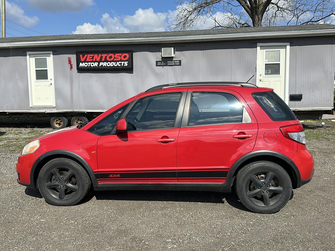 2009 Suzuki SX4 JX - Photo #1