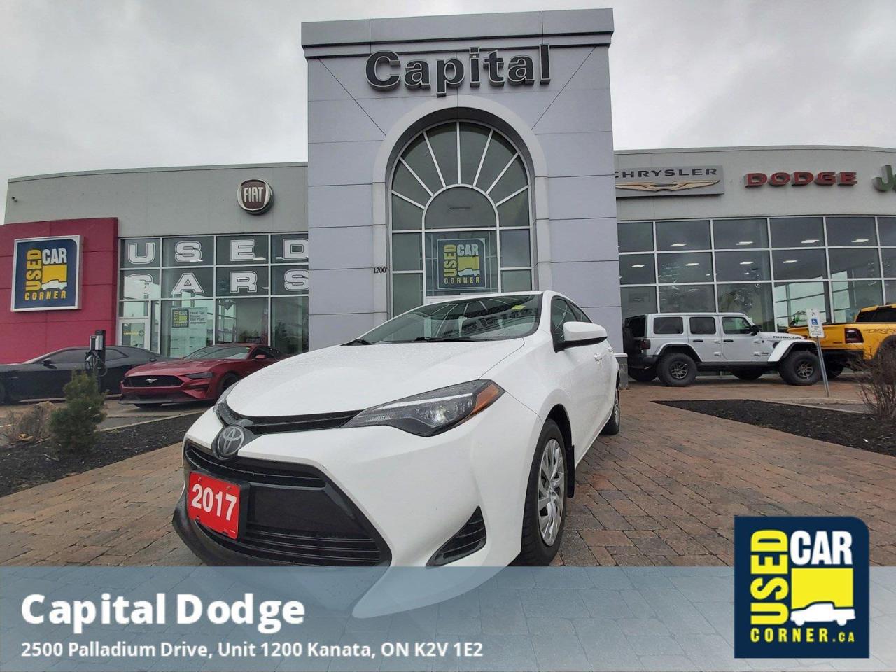 Were excited to offer this versatile 2017 Toyota Corolla . Trunk Rear Cargo Access, Trip Computer, Torsion Beam Rear Suspension w/Coil Springs, Strut Front Suspension w/Coil Springs, Steel Spare Wheel.*This Toyota Corolla Comes Equipped with These Options *Splash guards, Side Impact Beams, Seats w/Cloth Back Material, Remote Releases -Inc: Mechanical Cargo Access and Mechanical Fuel, Rear Cupholder, Rear Child Safety Locks, Radio: AM/FM/CD w/MP3/WMA Player -inc: 6.1 display screen, voice recognition, audio auxiliary input jack, USB audio input, Bluetooth capability, 6 speakers, glass imprinted antenna and Siri Eyes-Free, Radio w/Seek-Scan, Clock, Speed Compensated Volume Control, Steering Wheel Controls and Radio Data System, Pre-Collision System (PCS), Power Rear Windows.* Why Buy Capital Pre-Owned *All of our pre-owned vehicles come with the balance of the factory warranty, fully detailed and the safety is completed by one of our mechanics who has been servicing vehicles with Capital Dodge for over 35 years.* Visit Us Today *Stop by Capital Dodge Chrysler Jeep located at 2500 Palladium Dr Unit 1200, Kanata, ON K2V 1E2 for a quick visit and a great vehicle!*Call Capital Dodge Today!*Looking to schedule a test drive? Need more info? No problem - call Capital Dodge TODAY at (613) 271-7114. Capital Dodge is YOUR best choice for a variety of quality used Cars, Trucks, Vans, and SUVs in Ottawa, ON! Dont wait  Call Capital Dodge, TODAY!