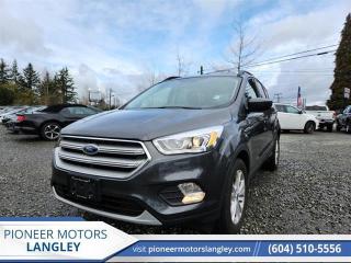 <b>Leather Seats,  SYNC 3,  Heated Seats,  Rear View Camera,  SiriusXM!</b><br> <br> At Pioneer Motors Langley, our team of professionals will guide you to make the right choice for your future vehicle. You will be advised as to the choice of the right vehicle and the best suitable financing for your needs. <br> <br> Compare at $30595 - Pioneer value price is just $29995! <br> <br>   The versatile Ford Escape continues to woo drivers across Canada with its good looks and practicality. This  2018 Ford Escape is for sale today in Langley. <br> <br>Although there are many compact SUVs to choose from, few have the styling, performance, and features offered by this 5-passenger Ford Escape. Beyond its strong, efficient drivetrain and handsome styling, this Escape offers nimble handling and a comfortable ride. The interior boasts smart design and impressive features. If you need the versatility of an SUV but want something fuel-efficient and easy to drive, this Ford Escape is just right. This  SUV has 62,946 kms. Its  nice in colour  . It has a 6 speed automatic transmission and is powered by a  179HP 1.5L 4 Cylinder Engine.  It may have some remaining factory warranty, please check with dealer for details. <br> <br> Our Escapes trim level is SEL. Upgrading to this 2018 Escape SEL offers a exceptional blend of features and value. It comes packed with a SYNC 3 infotainment system with Bluetooth connectivity, aluminum wheels, a power liftgate, fog lights, and body coloured bumpers. It also includes luxurious features like power front seats, a leather steering wheel, SiriusXM, a rearview camera, steering wheel-mounted audio and cruise control, dual-zone automatic climate control, Salerno leather seats, rear parking sensors, Fords MyKey system and much more. This vehicle has been upgraded with the following features: Leather Seats,  Sync 3,  Heated Seats,  Rear View Camera,  Siriusxm,  Aluminum Wheels,  Power Tailgate. <br> To view the original window sticker for this vehicle view this <a href=http://www.windowsticker.forddirect.com/windowsticker.pdf?vin=1FMCU9HD8JUD24560 target=_blank>http://www.windowsticker.forddirect.com/windowsticker.pdf?vin=1FMCU9HD8JUD24560</a>. <br/><br> <br>To apply right now for financing use this link : <a href=https://www.pioneermotorslangley.com/finance/ target=_blank>https://www.pioneermotorslangley.com/finance/</a><br><br> <br/><br> Buy this vehicle now for the lowest bi-weekly payment of <b>$222.25</b> with $0 down for 84 months @ 7.99% APR O.A.C. ( Plus applicable taxes -  Plus applicable fees   / Total Obligation of $41444  ).  See dealer for details. <br> <br>Let us make your visit to our dealership as pleasant and rewarding as it can be. All pricing is plus $995 Documentation fee and applicable taxes. o~o