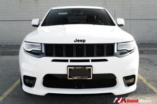 <p>The 2020 Jeep Grand Cherokee SRT is a high-performance SUV that combines luxury and power. Its equipped with a 6.4-liter V8 engine that delivers 470+ horsepower and 470 lb-ft of torque, providing a thrilling driving experience. The Grand Cherokee SRT also features advanced technology, including an 8.4-inch touchscreen infotainment system and a suite of driver-assistance features.</p>
<p>Some Other Features Include:</p>
<p>-Leather heated/ventilated seats</p>
<p>-Multifunctional Leather Steering Wheel</p>
<p>-Brembo Brakes</p>
<p>-Premium sound system</p>
<p>-Panoramic sunroof</p>
<p>-Blind spot assist</p>
<p>-Alloys and Much More!!</p><br><p>OPEN 7 DAYS A WEEK. FOR MORE DETAILS PLEASE CONTACT OUR SALES DEPARTMENT</p>
<p>905-874-9494 / 1 833-503-0010 AND BOOK AN APPOINTMENT FOR VIEWING AND TEST DRIVE!!!</p>
<p>BUY WITH CONFIDENCE. ALL VEHICLES COME WITH HISTORY REPORTS. WARRANTIES AVAILABLE. TRADES WELCOME!!!</p>