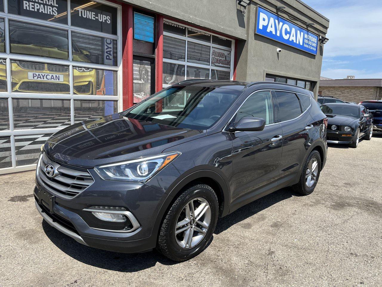 <p>LOOKING FOR NICE CLEAN FAMILY SUV THATS ECONOMICAL AND RELIABLE COME CHECK THIS SANTA FE SOLD CERTIFIED OR CALL 5195706463 FOR AN APPOINTENT .TO SEE OUR FULL INVENTORY PLS GO TO PAYCANMOTORS.CA</p>