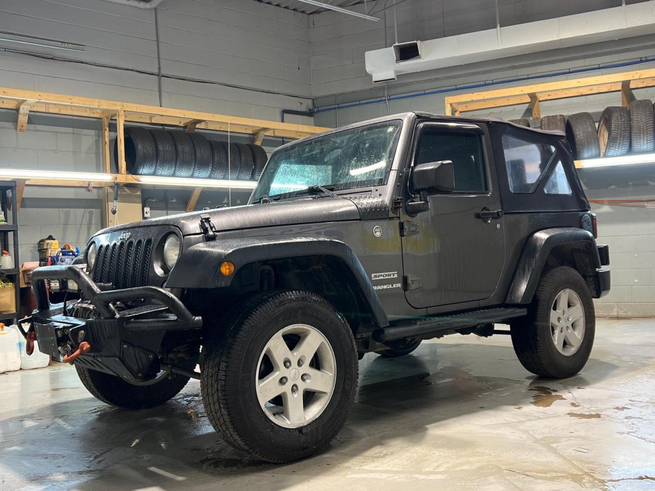 Used 2016 Jeep Wrangler Sport 4X4 * Front Bull Bar W/ Smitty Bilt XRC Winch * 3.73 rear axle ratio * Radio 430 6.5-inch touchscreen AM/FM/CD/Hard-drive * 9 premium Alpine spe for sale in Cambridge, ON