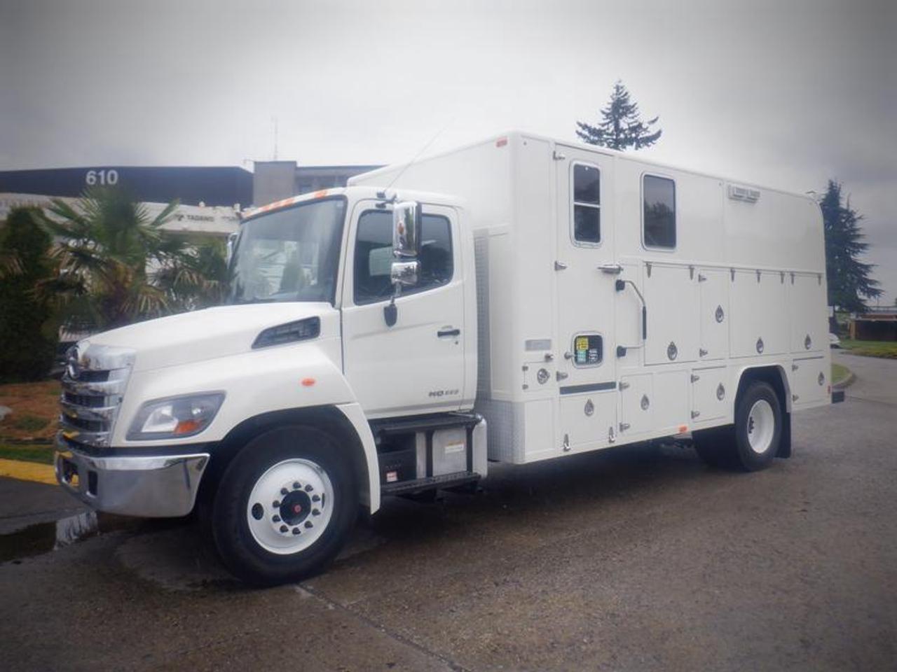 2014 Hino 338 wire line Service Truck with Office, 7.6L, L6 DIESEL engine, 6 cylinder, cruise control, air conditioning, AM/FM radio, power windows, back up camera, white exterior, black interior, cloth.  4712 Engine hours Certificate and Decal valid to March 2024 This item is currently OFFSITE. You must register an appointment with our office to schedule an offsite viewing. Appointments must be made a minimum of one business day in advance (and as defined by the days that Repo.com is open for business) before your appointment can be scheduled and confirmed. We may, at our own discretion, instead opt to transport smaller items to Repo.coms main yard for viewing purposes.  $54,710.00 plus $375 processing fee, $55,085.00 total payment obligation before taxes.   Listing report, warranty, contract commitment cancellation fee, financing available on approved credit (some limitations and exceptions may apply). All above specifications and information is considered to be accurate but is not guaranteed and no opinion or advice is given as to whether this item should be purchased. We do not allow test drives due to theft, fraud, acts of vandalism and undetectable impaired driving. Instead we provide the following benefits: Complimentary Warranty (with options to extend), Limited Money Back Satisfaction Guarantee on Fully Completed Contracts, Contract Commitment Cancellation, and an Open-Ended Sell-Back Option. Ask seller for details or call 604-522-REPO(7376) to confirm listing availability.
