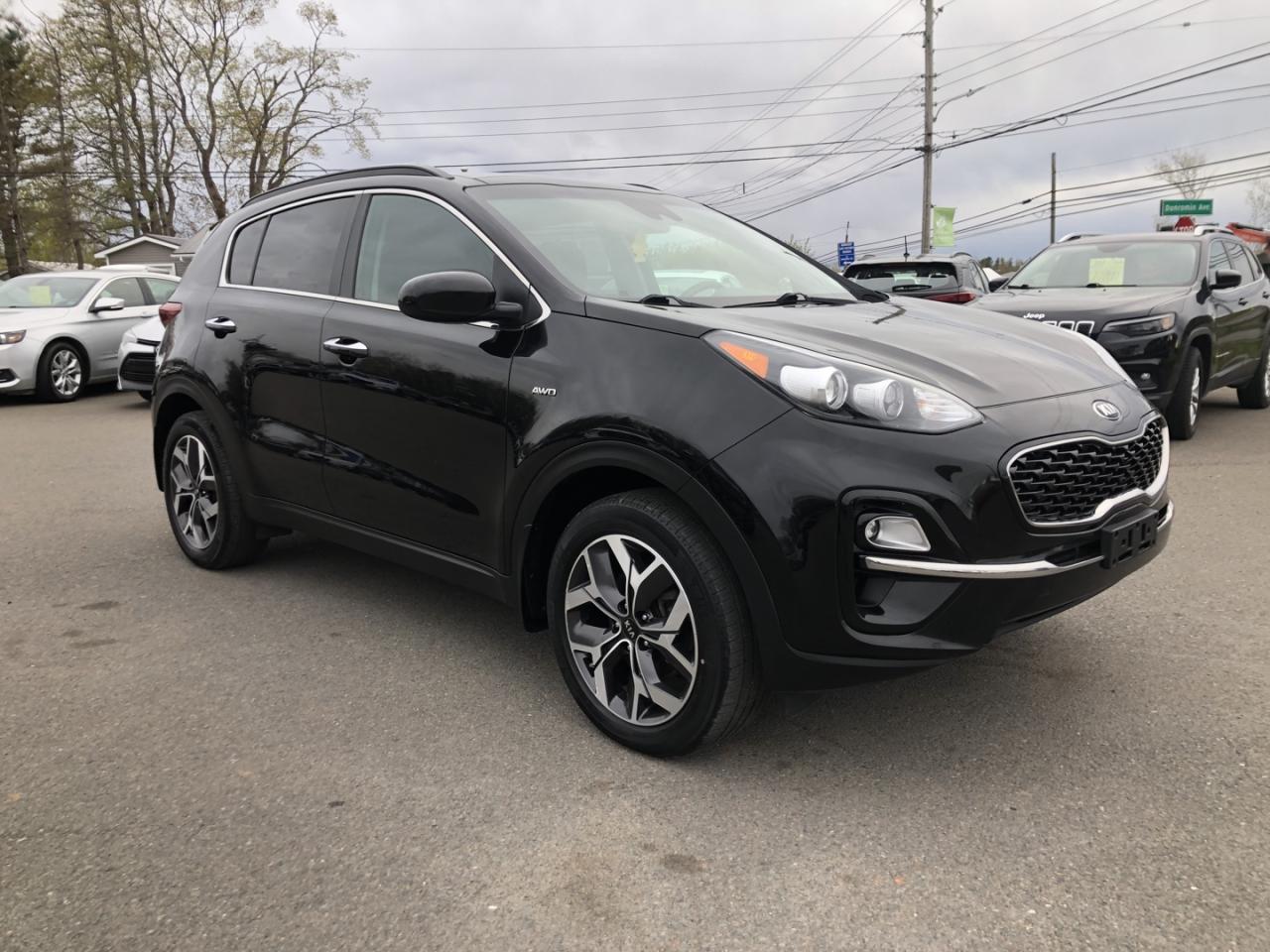 <div><span>Here we have an AWD 2020 Kia Sportage EX! This Vehicle is in Excellent Condition Inside out and comes equipped with great options! Starting with Alloy Wheels, AC, Heated Seats and Steering Wheel, Double Sunroof, Back Up Camera, Push To Start, Touch Screen Display, All Power Options, Bluetooth Audio & Calling, AWD Lock, Driving Mode Selection, Lane Assist, Satellite Radio, Cruise and Traction Control, USB Port. There is only 87,000 KMS on this unit, making it eligible for some of the Manufacturers Powertrain 100,000 KM Warranty. List Price: $26,900.</span></div><br /><div><br></div><br /><div><span>This Suv comes with A New Multi Point Safety Inspection, 1 Month Powertrain Warranty, and an option to extend the warranty to what you would like! All Credit Applications Welcome! All Financing Available, with over 10 lenders to get you approved no matter your credit level! Scammell Auto proudly serves the Truro, Bible Hill, New Glasgow, Antigonish, Cape Breton, Dartmouth, Halifax, Kentville, Amherst, Sackville, and greater area of Nova Scotia and New Brunswick. Scammell Auto is a family run business, come see us today for a unique and pleasant buying experience! You can view all of our inventory online @ www.scammellautosales.ca or give us a call- 902-843-3313 (office) or anytime at 902-899-8428</span><br></div>