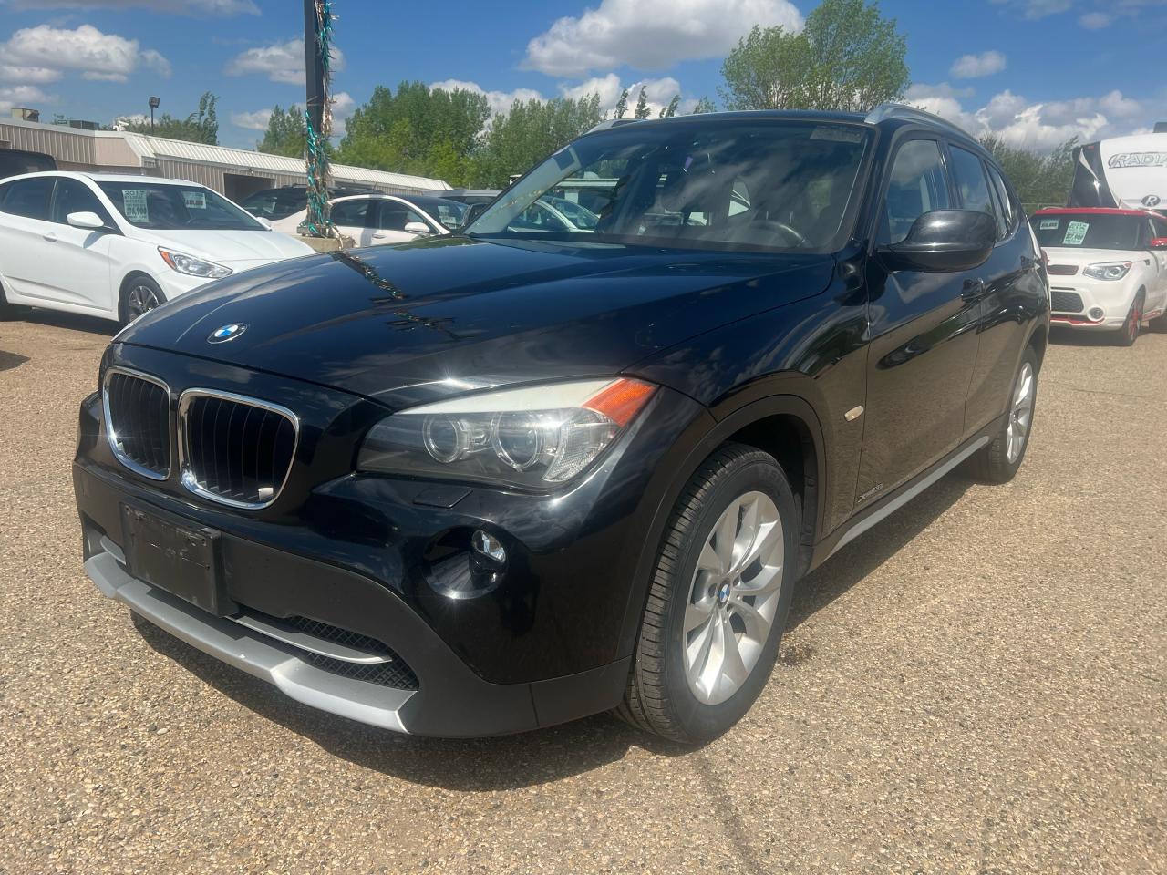 2012 BMW X1 NAV Panoramic Sun-roof Heated Seats park assist - Photo #1