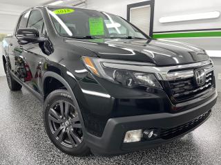 <p style=margin: 0px; font-stretch: normal; font-size: 13px; line-height: normal; font-family: Helvetica Neue;>At RuralWorx Auto Sales we have a FULLY LOADED 2018 Honda Ridgeline EX-L AWD! This truck looks and drives awesome! It also comes with a BRAND NEW MVI, BRAND NEW ALL SEASON TIRES ON Alloy wheels, BRAND NEW BRAKES (Front & Rear; Rotors & pads), a fresh oil change & filters PLUS a clean CARFAX! No accidents </p><p style=margin: 0px; font-stretch: normal; font-size: 13px; line-height: normal; font-family: Helvetica Neue; min-height: 15px;> </p><p style=margin: 0px; font-stretch: normal; font-size: 13px; line-height: normal; font-family: Helvetica Neue;>FINANCING AVAILABLE!!! </p><p style=margin: 0px; font-stretch: normal; font-size: 13px; line-height: normal; font-family: Helvetica Neue; min-height: 15px;> </p><p style=margin: 0px; font-stretch: normal; font-size: 13px; line-height: normal; font-family: Helvetica Neue;>The RuralWorx Auto Sales “Satisfaction Guaranteed” checklist! This checklist is completed on every sale of a vehicle through our honest and laid back business! </p><p style=margin: 0px; font-stretch: normal; font-size: 13px; line-height: normal; font-family: Helvetica Neue; min-height: 15px;> </p><p style=margin: 0px; font-stretch: normal; font-size: 13px; line-height: normal; font-family: Helvetica Neue;>Checklist:</p><p style=margin: 0px; font-stretch: normal; font-size: 13px; line-height: normal; font-family: Helvetica Neue;>New MVI + FREE MVIs FOR THE LIFETIME OF THE VEHICLE! </p><p style=margin: 0px; font-stretch: normal; font-size: 13px; line-height: normal; font-family: Helvetica Neue;>Fully detailed inside and out</p><p style=margin: 0px; font-stretch: normal; font-size: 13px; line-height: normal; font-family: Helvetica Neue;>Fresh oil change</p><p style=margin: 0px; font-stretch: normal; font-size: 13px; line-height: normal; font-family: Helvetica Neue;>Brand new or like new tires</p><p style=margin: 0px; font-stretch: normal; font-size: 13px; line-height: normal; font-family: Helvetica Neue;>No Doc fee when buying outright! </p><p style=margin: 0px; font-stretch: normal; font-size: 13px; line-height: normal; font-family: Helvetica Neue; min-height: 15px;> </p><p style=margin: 0px; font-stretch: normal; font-size: 13px; line-height: normal; font-family: Helvetica Neue;>About this vehicle;</p><p style=margin: 0px; font-stretch: normal; font-size: 13px; line-height: normal; font-family: Helvetica Neue;>-196,000km</p><p style=margin: 0px; font-stretch: normal; font-size: 13px; line-height: normal; font-family: Helvetica Neue;>-HEATED SEATS</p><p style=margin: 0px; font-stretch: normal; font-size: 13px; line-height: normal; font-family: Helvetica Neue;>-LEATHER POWER SEATS </p><p style=margin: 0px; font-stretch: normal; font-size: 13px; line-height: normal; font-family: Helvetica Neue;>-REAR AND SIDE VIEW CAMERAS! </p><p style=margin: 0px; font-stretch: normal; font-size: 13px; line-height: normal; font-family: Helvetica Neue;>-SUNROOF! </p><p style=margin: 0px; font-stretch: normal; font-size: 13px; line-height: normal; font-family: Helvetica Neue;>-HEATED STEERING WHEEL </p><p style=margin: 0px; font-stretch: normal; font-size: 13px; line-height: normal; font-family: Helvetica Neue;>-Power Windows </p><p style=margin: 0px; font-stretch: normal; font-size: 13px; line-height: normal; font-family: Helvetica Neue;>-Power mirrors</p><p style=margin: 0px; font-stretch: normal; font-size: 13px; line-height: normal; font-family: Helvetica Neue;>-Power locks </p><p style=margin: 0px; font-stretch: normal; font-size: 13px; line-height: normal; font-family: Helvetica Neue;>-Adaptive Cruise Control & lane keep assist </p><p style=margin: 0px; font-stretch: normal; font-size: 13px; line-height: normal; font-family: Helvetica Neue;>-Bluetooth (Hands free calling)</p><p style=margin: 0px; font-stretch: normal; font-size: 13px; line-height: normal; font-family: Helvetica Neue;>-Steering wheel controls (radio controls) </p><p style=margin: 0px; font-stretch: normal; font-size: 13px; line-height: normal; font-family: Helvetica Neue;>-ICE COLD AIR CONDITIONING </p><p style=margin: 0px; font-stretch: normal; font-size: 13px; line-height: normal; font-family: Helvetica Neue;>-Dual zone climate control </p><p style=margin: 0px; font-stretch: normal; font-size: 13px; line-height: normal; font-family: Helvetica Neue;>-Automatic Transmission </p><p style=margin: 0px; font-stretch: normal; font-size: 13px; line-height: normal; font-family: Helvetica Neue;>-Fresh oil change </p><p style=margin: 0px; font-stretch: normal; font-size: 13px; line-height: normal; font-family: Helvetica Neue;>-Freshly detailed inside and out </p><p style=margin: 0px; font-stretch: normal; font-size: 13px; line-height: normal; font-family: Helvetica Neue;>-BRAND NEW ALL SEASON TIRES </p><p style=margin: 0px; font-stretch: normal; font-size: 13px; line-height: normal; font-family: Helvetica Neue;>-BRAND NEW BRAKES!! Rotors & pads </p><p style=margin: 0px; font-stretch: normal; font-size: 13px; line-height: normal; font-family: Helvetica Neue;>-Keyless entry </p><p style=margin: 0px; font-stretch: normal; font-size: 13px; line-height: normal; font-family: Helvetica Neue;>-Push button start! </p><p style=margin: 0px; font-stretch: normal; font-size: 13px; line-height: normal; font-family: Helvetica Neue;>-Factory  Mats </p><p style=margin: 0px; font-stretch: normal; font-size: 13px; line-height: normal; font-family: Helvetica Neue;>-6 cylinder engine</p><p style=margin: 0px; font-stretch: normal; font-size: 13px; line-height: normal; font-family: Helvetica Neue;>And so much more..</p><p style=margin: 0px; font-stretch: normal; font-size: 13px; line-height: normal; font-family: Helvetica Neue; min-height: 15px;> </p><p style=margin: 0px; font-stretch: normal; font-size: 13px; line-height: normal; font-family: Helvetica Neue;>Priced at ONLY: $29,995 plus taxes & licensing</p><p style=margin: 0px; font-stretch: normal; font-size: 13px; line-height: normal; font-family: Helvetica Neue;>Hard to find Ridgeline! Very desirable truck!  </p><p style=margin: 0px; font-stretch: normal; font-size: 13px; line-height: normal; font-family: Helvetica Neue; min-height: 15px;> </p><p style=margin: 0px; font-stretch: normal; font-size: 13px; line-height: normal; font-family: Helvetica Neue;>If you are interested in viewing this beautiful pickup or have any questions or concerns please email/message or call/text 902-956-0179. Contact us ANYTIME! Thank you for viewing! Feel free to check out our other ads, or contact us if you have a certain car in mind! WE WILL FIND IT FOR YOU! </p><p style=margin: 0px; font-stretch: normal; font-size: 13px; line-height: normal; font-family: Helvetica Neue; min-height: 15px;> </p><p style=margin: 0px; font-stretch: normal; font-size: 13px; line-height: normal; font-family: Helvetica Neue;>You can also visit our Facebook & Instagram to stay up to date on our new vehicles and GIVEAWAYS we have throughout the year! Also check out our REVIEWS! </p><p style=margin: 0px; font-stretch: normal; font-size: 13px; line-height: normal; font-family: Helvetica Neue; min-height: 15px;> </p><p style=margin: 0px; font-stretch: normal; font-size: 13px; line-height: normal; font-family: Helvetica Neue;>Facebook: RuralWorx AutoSales </p><p style=margin: 0px; font-stretch: normal; font-size: 13px; line-height: normal; font-family: Helvetica Neue;>Instagram: ruralworx_autosales</p>